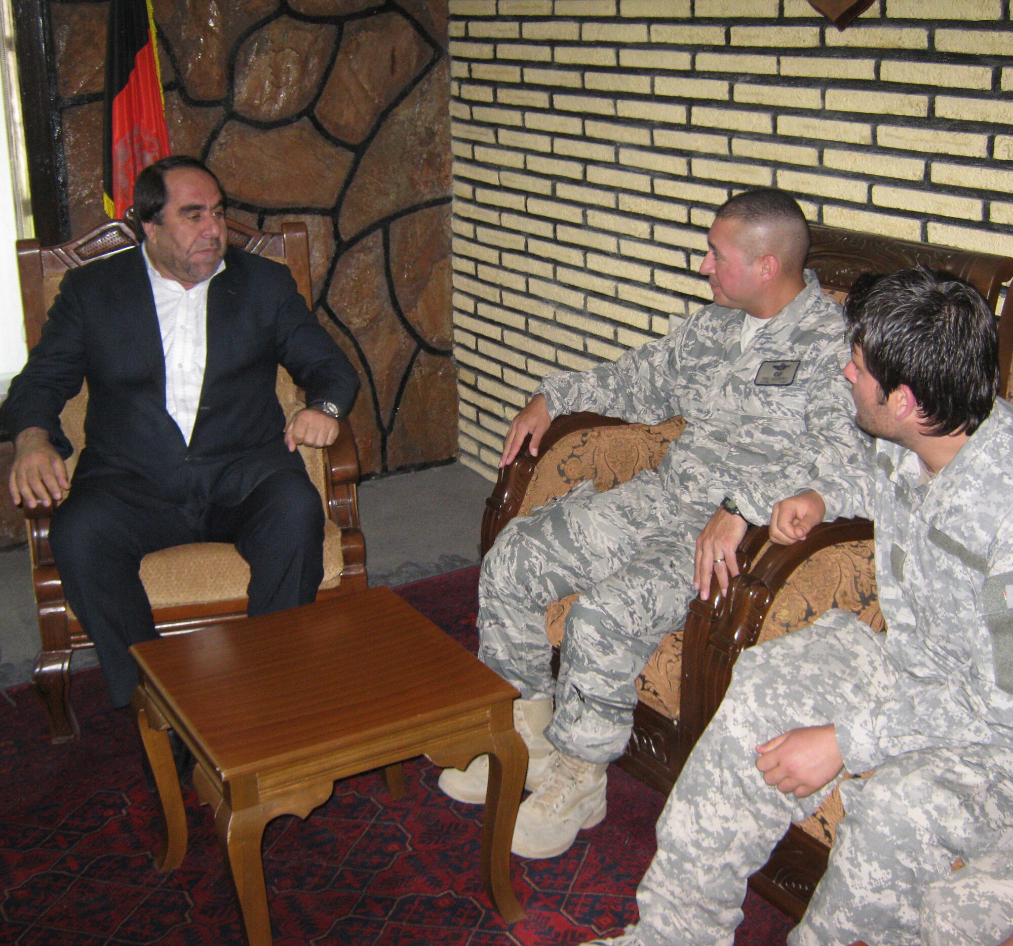 Panjshir Gov. Keramuddin Keram (left) talks with U.S. Air Force Lt. Col. Curtis Velasquez, Provincial Reconstruction Team Panjshir commander and Abilene, Kan., native, July 1 about a project that could potentially bring 35,000 new trees into the province by the end of the year. (Photo by U.S. Air Force 2nd Lt. Jason Smith, PRT Panjshir Public Affairs)