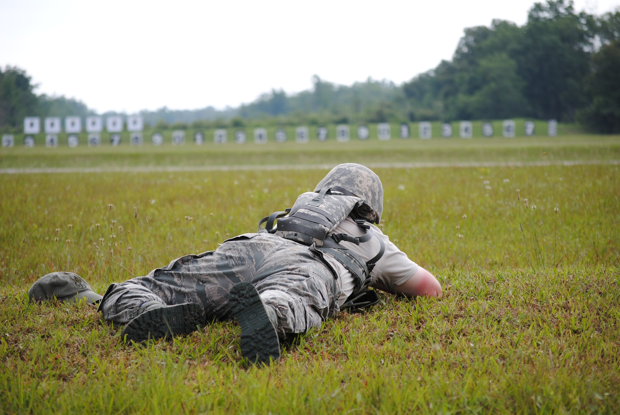 Technical Sergeant Rice of the 164AW fires from a prone position at targets 400 yards away during 2010 Tennessee Air NAtional Guard shooting competition.