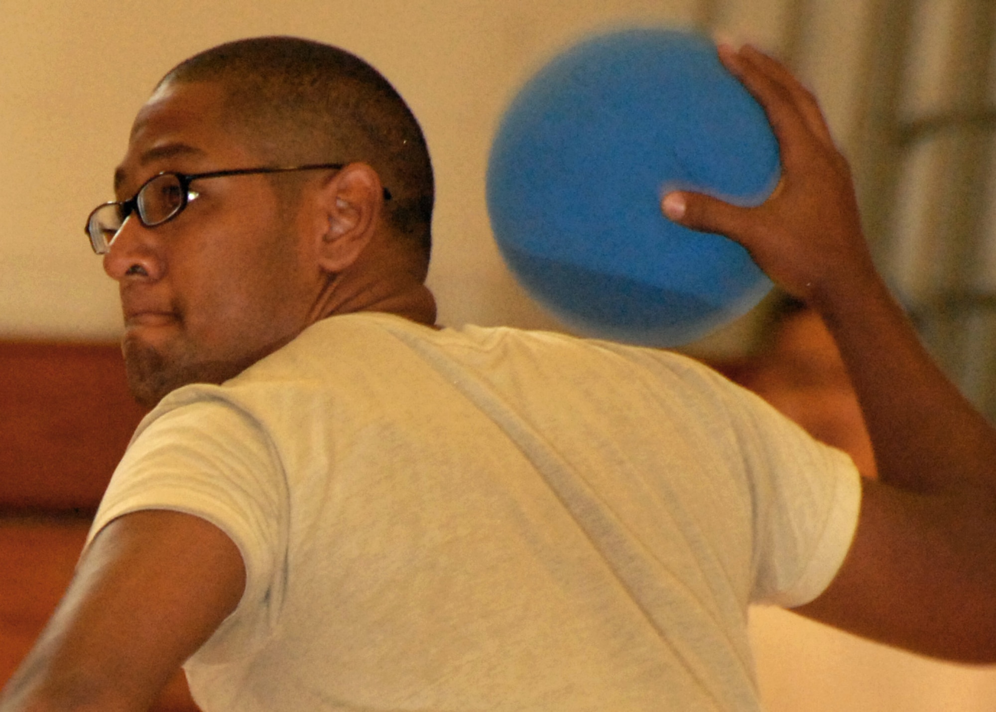 A player tries to "bean" a rival from the other team during a dodgeball tournament held at the fitness center July 9.  Air Force Research Lab team members took first place in the tournament.  The winning team was Joe Czabaranek, Ryan Snider, Brian Nagle, Jordan Harrison and Tim Ager.  U.S. Air Force photo/Samuel King Jr.
