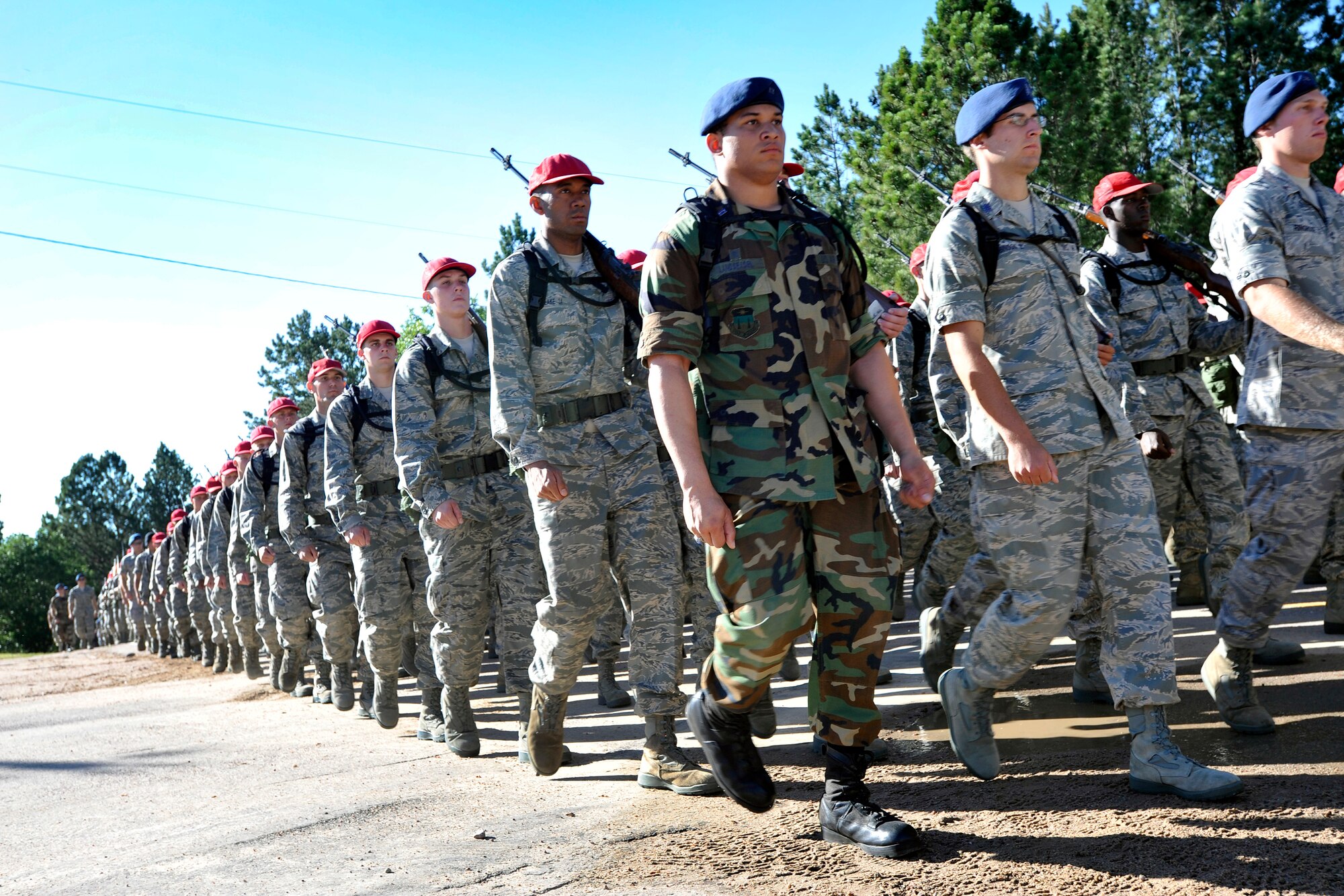 Cadets with the Class of 2014 march along an unpaved road in Jacks Valley at the Air Force Academy July 11, 2010. The class has adopted the motto "Like a Machine" in the three weeks since inprocessing. (U.S. Air Force photo/Bill Evans)