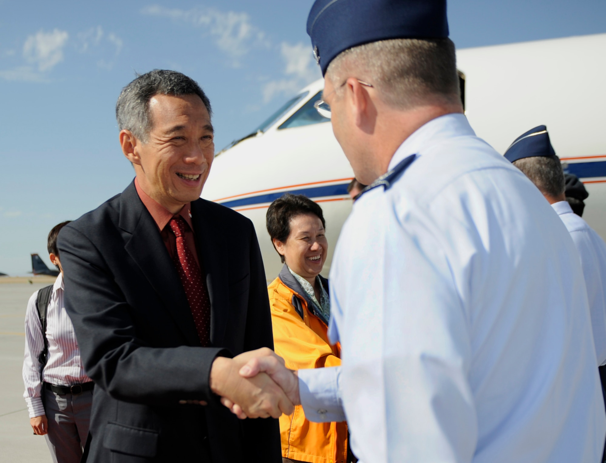 MOUNTAIN HOME AIR FORCE BASE, Idaho – Col. Ron Buckley, 366th Fighter Wing commander, welcomes Mr. Lee Hsien Loong, Republic of Singapore prime minister, to the base July 11. Prime Minister Lee visited the base in order to tour the 428th Fighter Squadron, a squadron operated by members of the Republic of Singapore Air Force and the U.S. Air Force, and to meet with RSAF Airmen and their families. Prime Minister Lee toured base facilities, received mission briefings and discussed the importance of the partnership between the U.S. and Singapore. (U.S. Air Force photo by Senior Airman Renishia Richardson)