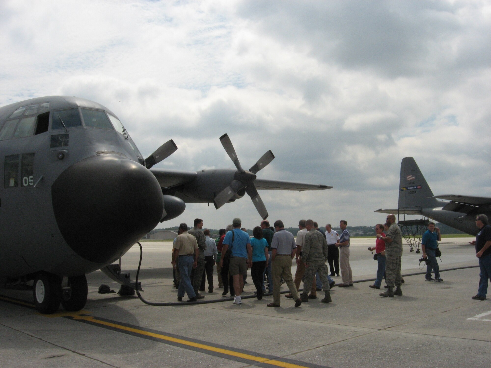 Civilian employers of Dobbins servicemembers gather around the C-130 here on July 10. (US Air Force photo by JD Markmann)