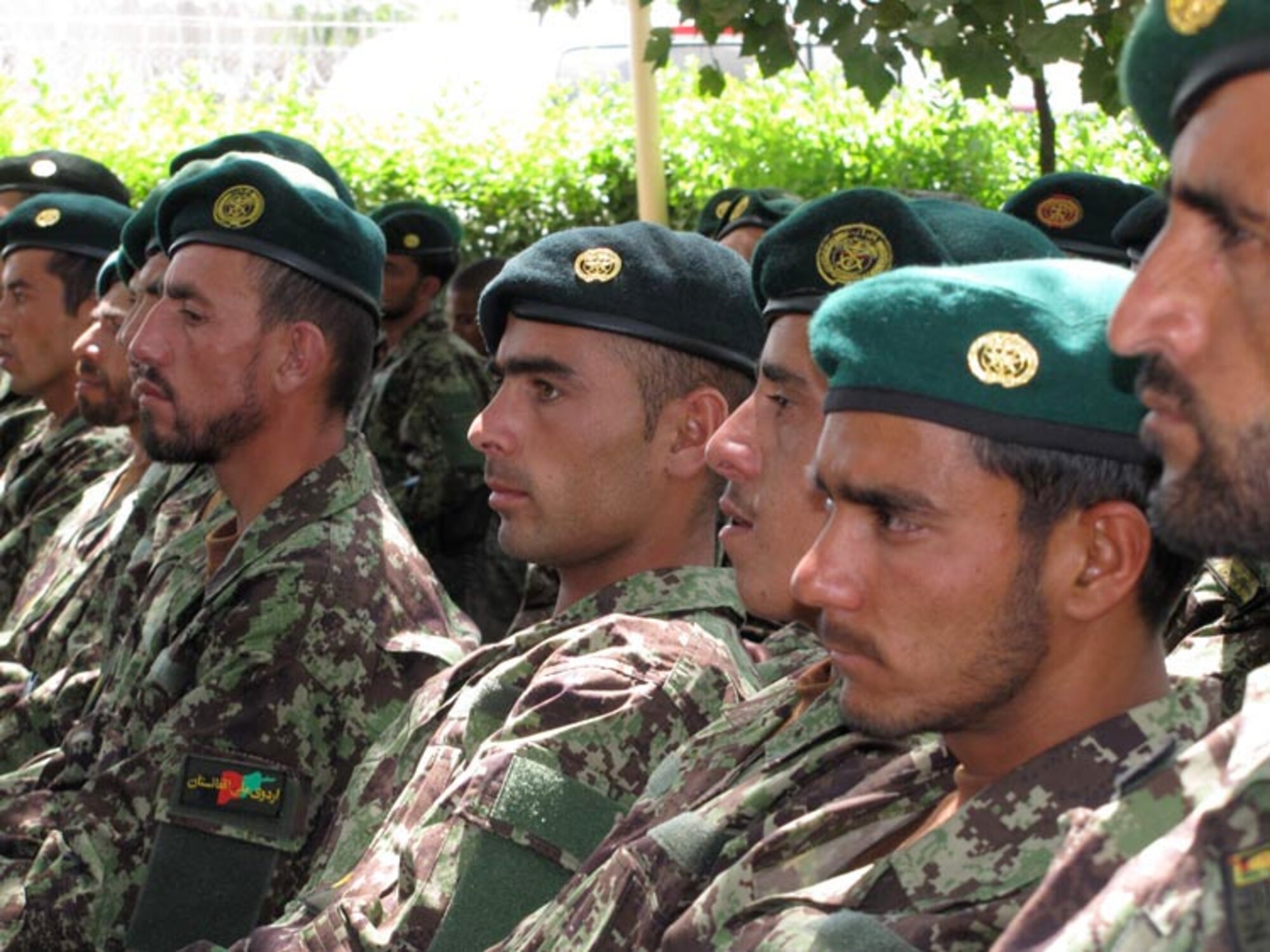Non-Commissioned Officers graduate from the Team Leader Course of the Afghan Air Force on the Afghan Air Force base in Kabul on Jul. 11, 2010 (U.S. Navy photo by Mass Communications Specialist First Class Elizabeth Burke/RELEASED).