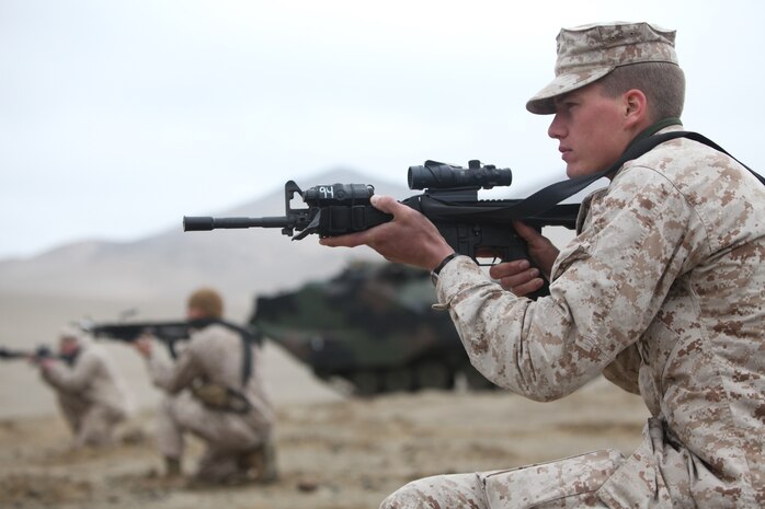Marines with Special Purpose Marine Air-Ground Task Force 24 conduct a amphibious assault rehearsal on a beach with Amphibious Assault Vehicles from 3rd Assault Amphibian Battalion in Salinas, Peru, July 11. The U.S. Marines were embarked aboard transport dock ship USS New Orleans (LPD 18) in support of Partnership of the Americas/Southern Exchange, a combined amphibious exercise with maritime forces from Argentina, Mexico, Peru, Brazil, Uruguay and Colombia.