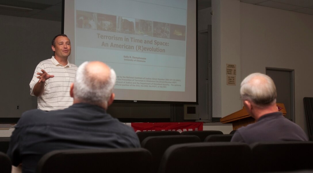 Kelly Damphousse, an associate professor with the University of Oklahoma’s Department of Sociology, gives his Evolution of Revolution Brief to dozens of service members and civilian personnel assigned to U.S. Marine Corps Forces, Pacific, and Pacific Command July 12 at MarForPac Headquarters, Camp H.M. Smith, Hawaii. The purpose of the training was to recognize vulnerabilities and trends associated with terrorism tactics and how they evolve over time.