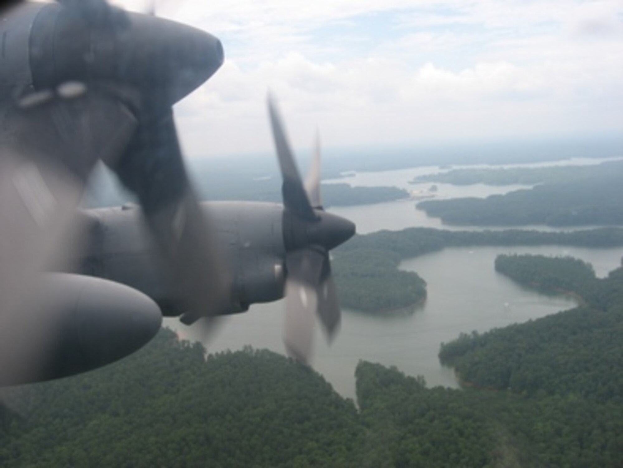 Porthole view from C-130 Hercules over Lake Allatoona with civilian employers aboard for Dobbins Employer Day  July 10.  (U.S. Air Force photo/JD Marckmann)