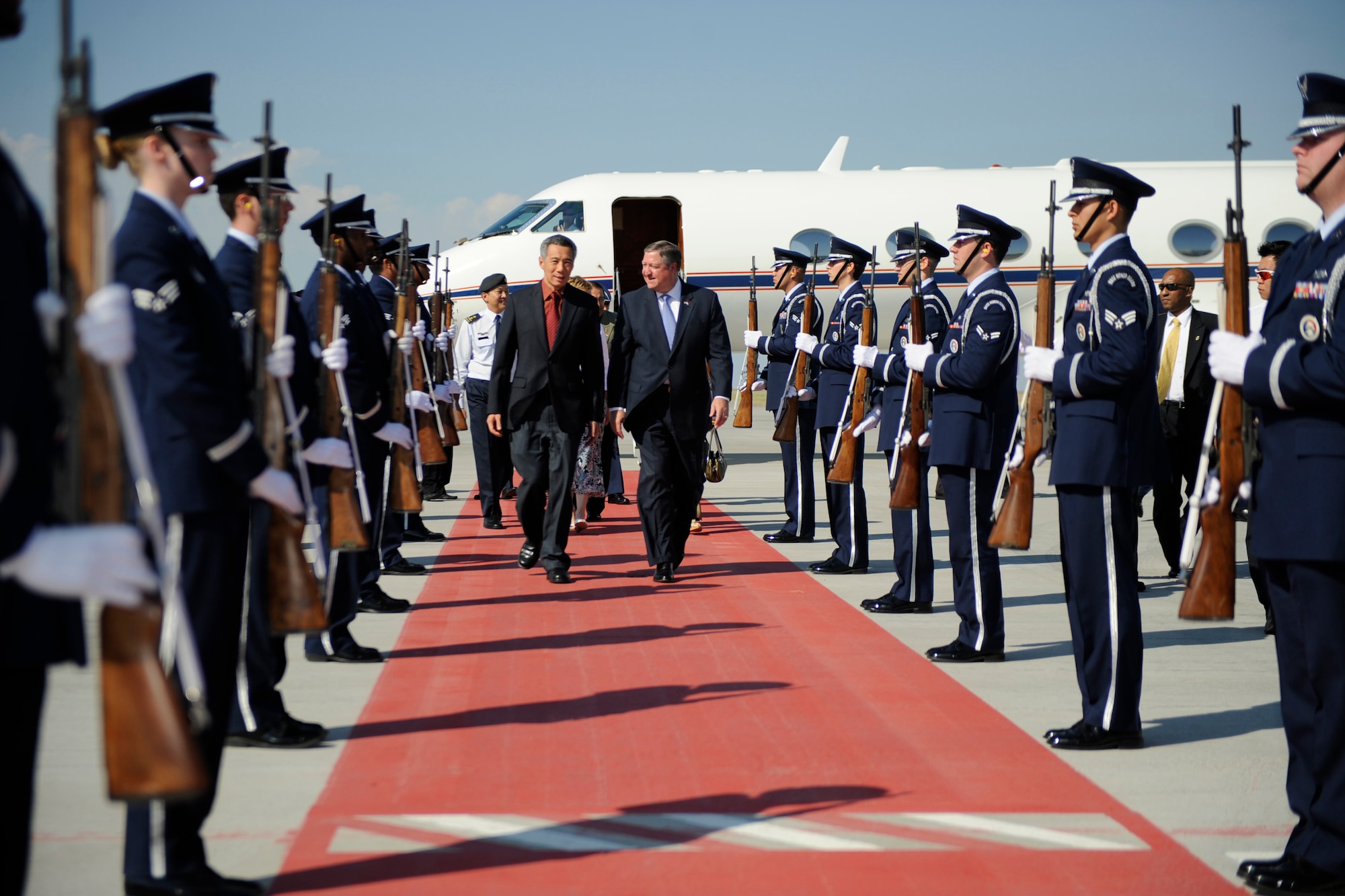 MOUNTAIN HOME AIR FORCE BASE, Idaho -- Secretary of the Air Force Michael Donley (right) escorts Singapore's Prime Minister Lee Hsien Loong through an Honor Guard cordon at Mountain Home Air Force Base, Idaho, 11 July. Prime Minister Lee visited the base in order to tour the 428th Fighter Squadron, a squadron operated by members of the Republic of Singapore Air Force and the U.S. Air Force, and to meet with RSAF Airmen and their families. Secretary Donley and Prime Minister Lee toured base facilities, received mission briefings and discussed the importance of the partnership between the U.S. and Singapore. (U.S. Air Force photo by Senior Airman Renishia Richardson)