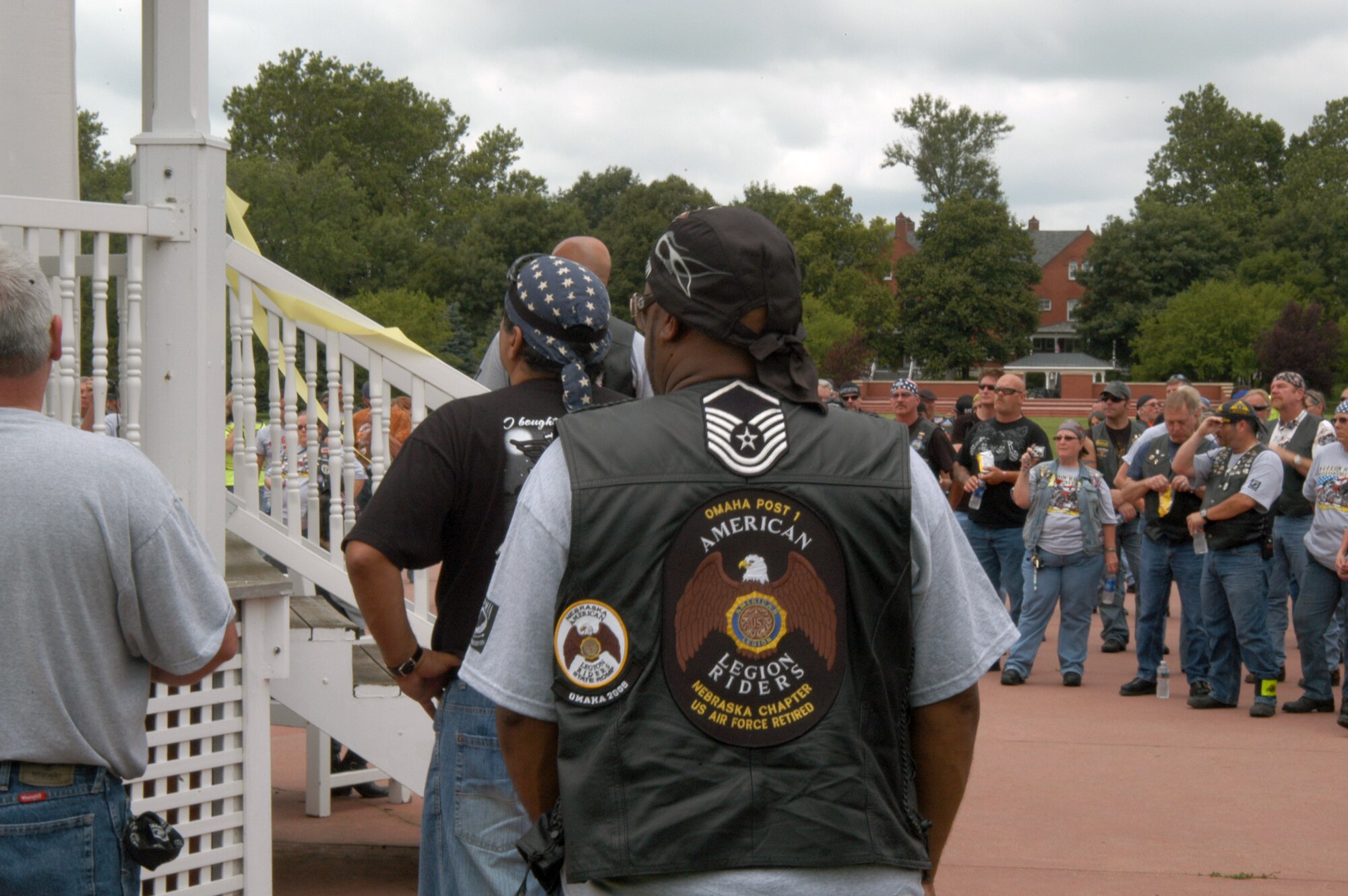OFFUTT AIR FORCE BASE, Neb. - Motorcycle riders listen to Brig. Gen. John N.T. Shanahan, 55th Wing commander, at the base parade grounds during the 8th Annual Yellow Ribbon Run July 11. Funds raised by the Yellow Ribbon Run riders totaled more than $6,300 for the Family Support Centers of Nebraska. U.S. Air Force photo by Airman 1st Class Peter R.O. Danielson
                                