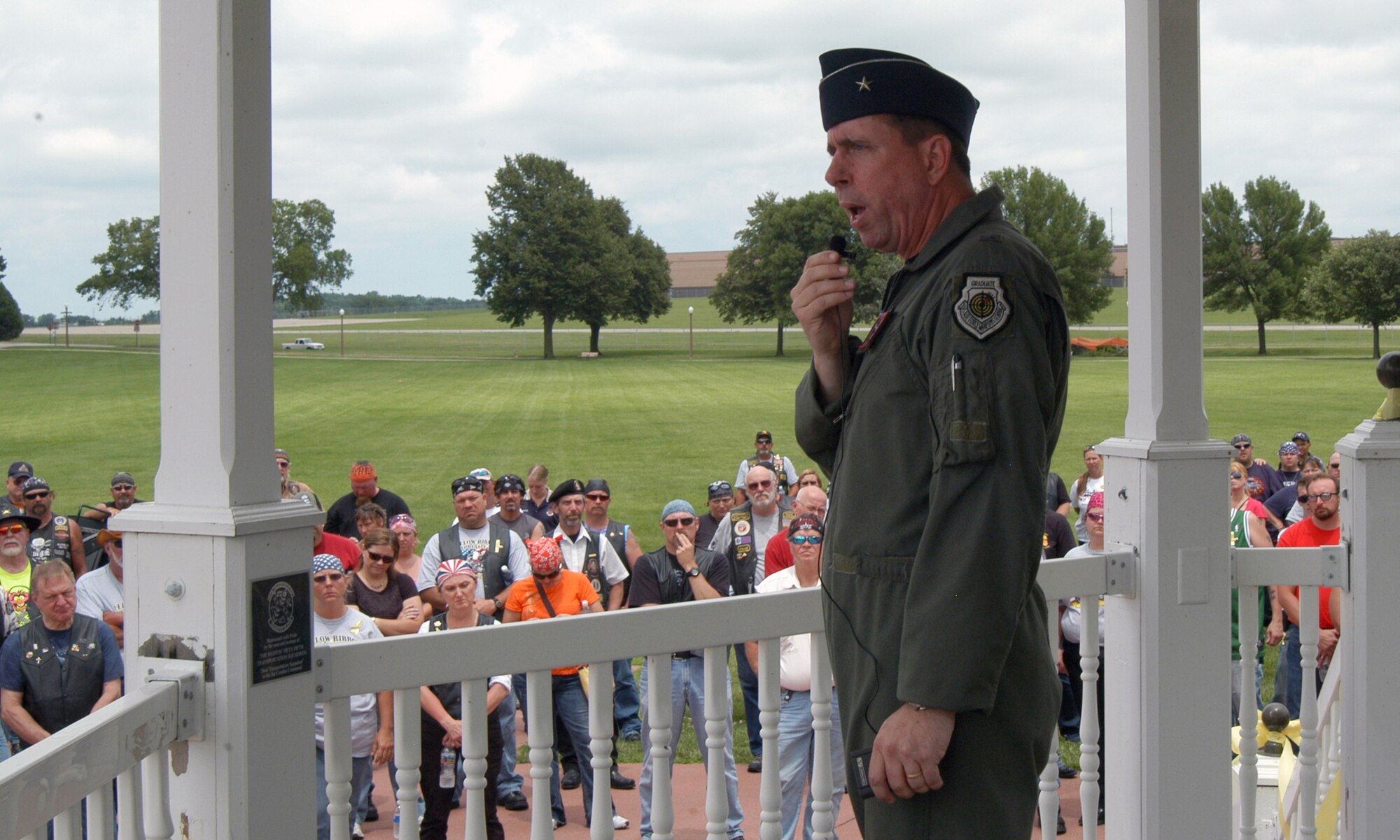 OFFUTT AIR FORCE BASE, Neb. - Brig. Gen. John N.T. Shanahan, 55th Wing commander, addresses more than 450 motorcyclists in the base parade grounds' gazebo during the 8th Annual Yellow Ribbon Run July 11. General Shanahan thanked the group for their patriotism and support, particularly the Patriot Guard Riders for their help during recent months. U.S. Air Force photo by Airman 1st Class Peter R.O. Danielson 
                                
