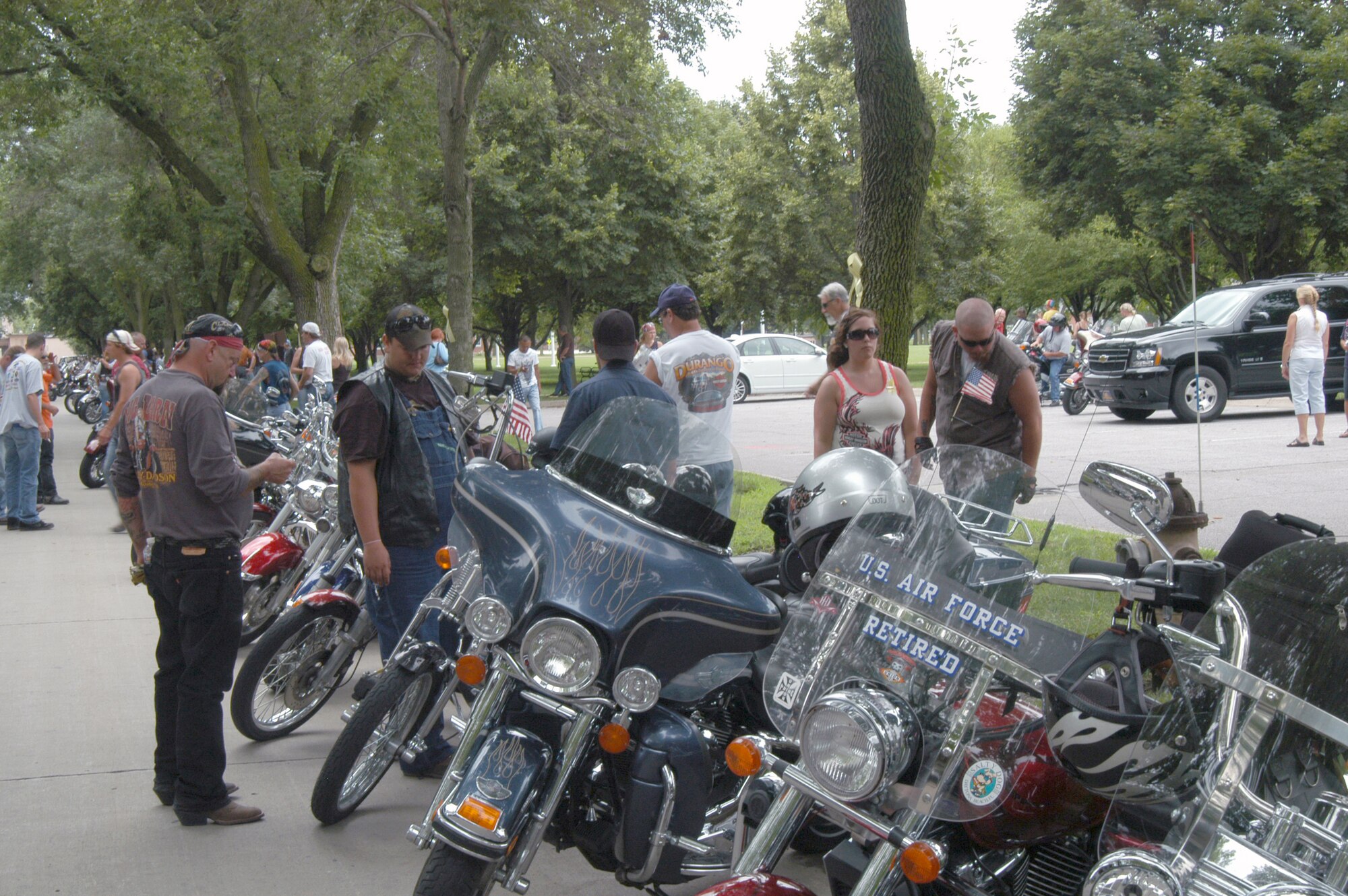 OFFUTT AIR FORCE BASE, Neb. - Motorcycle riders gather at the base parade grounds during the 8th Annual Yellow Ribbon Run July 11. This marks the fifth year Team Offutt has hosted the Yellow Ribbon Run on base. U.S. Air Force photo by Airman 1st Class Peter R.O. Danielson
                                