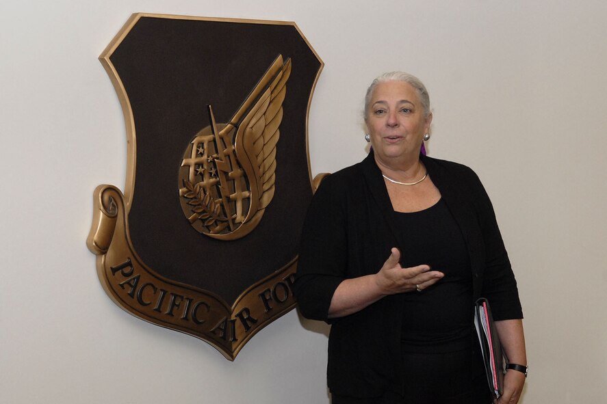 Combined Federal Campaign oversea representative Mrs. Renee Acosta addresses the Pacific Air Forces staff during a meeting at the Kenney Conference Center, Headquarters Pacific Air Forces, Joint Base Pearl Harbor Hickam, Hawaii, July 8, 2010.  Mrs. Acosta expressed her gratitude for PACAF donating 1.3 million dollars to the CFC this year.  She presented Pacific Air Forces Commander General Gary North with a check for $69, 635.11 to help support the PACAF Family Support and Youth Programs.  (U.S. Air Force photo/Tech. Sgt. Jerome S. Tayborn)