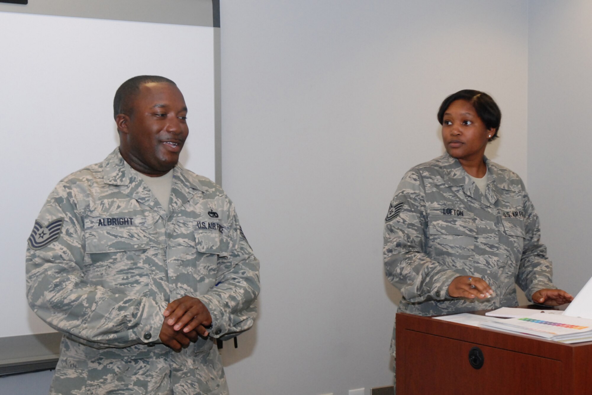 Tech. Sgt. Tanisha R. Lofton, president, Dobbins 56 Group, welcomes newly elected treasurer, Tech. Sgt. Aaron J. Albright to the 56 Group Executive Board during the monthly meeting July 11. Sergeant Albright brings years of finance and business experience to the group. (U.S. Air Force photo/Master Sgt. James Branch)