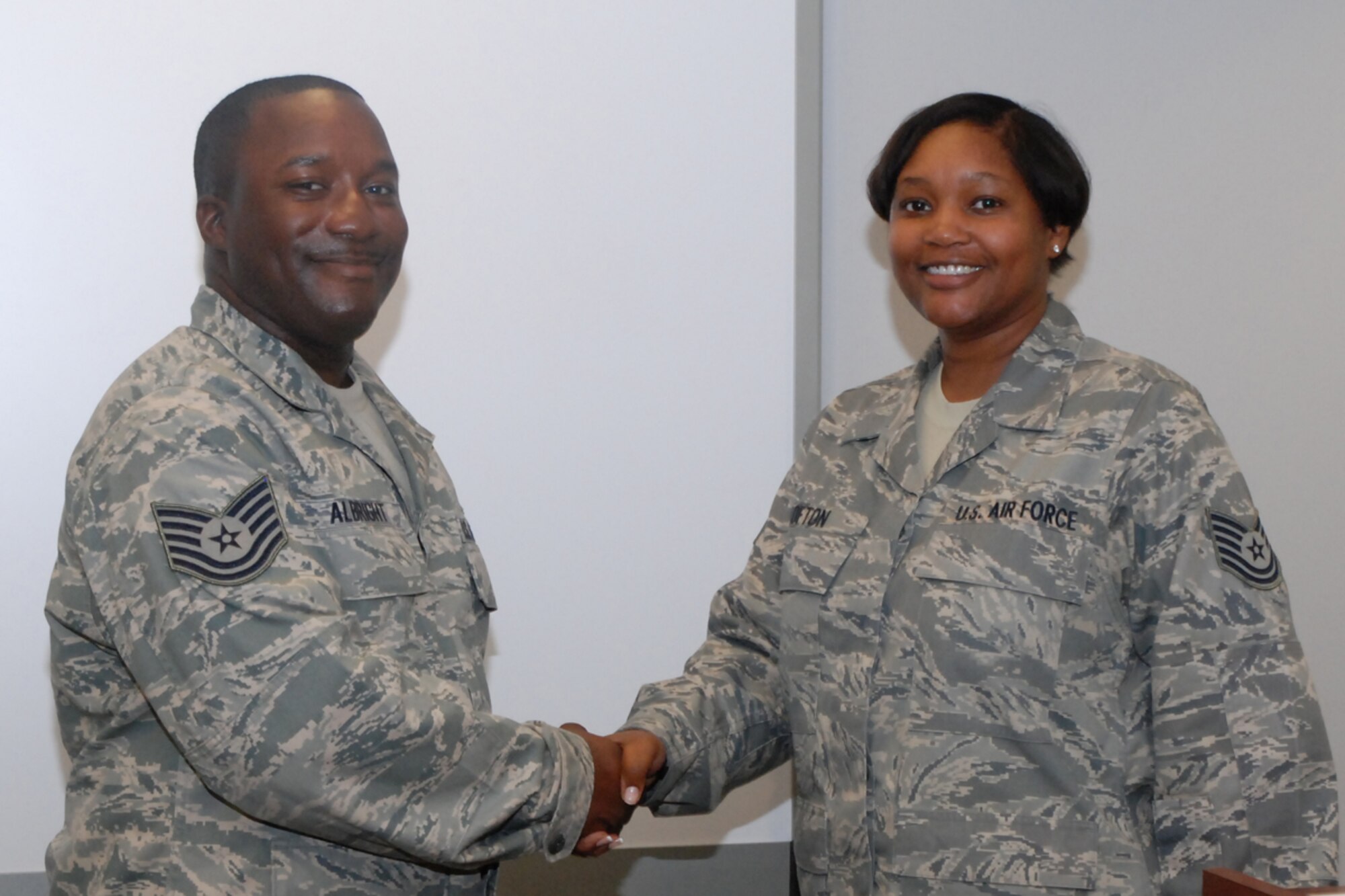 Tech. Sgt. Tanisha R. Lofton, president, Dobbins 56 Group, welcomes newly elected treasurer, Tech. Sgt. Aaron J. Albright to the 56 Group Executive Board during the monthly meeting July 11. Sergeant Albright brings years of finance and business experience to the group. (U.S. Air Force photo/Master Sgt. James Branch)
