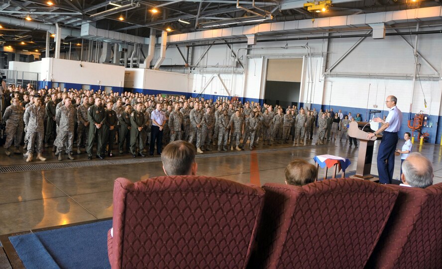 OFFUTT AIR FORCE BASE, Neb. - Gen. Kevin P. Chilton, commander of U.S. Strategic Command, congratulates more than 300 members of the 55th Wing July 7 before they were awarded the 2009 Omaha Trophy for strategic aircraft operations. The Omaha Trophy is awarded annually to four military units demonstrating the highest performance standards in U.S. Strategic Command mission areas, according to the command. 55th Wing Commander Brig. Gen. John N.T. Shanahan accepted the trophy at the Bennie Davis Maintenance Facility on behalf of all Fightin' Fifty Fifth members. U.S. Air Force photo by Jeff W. Gates.