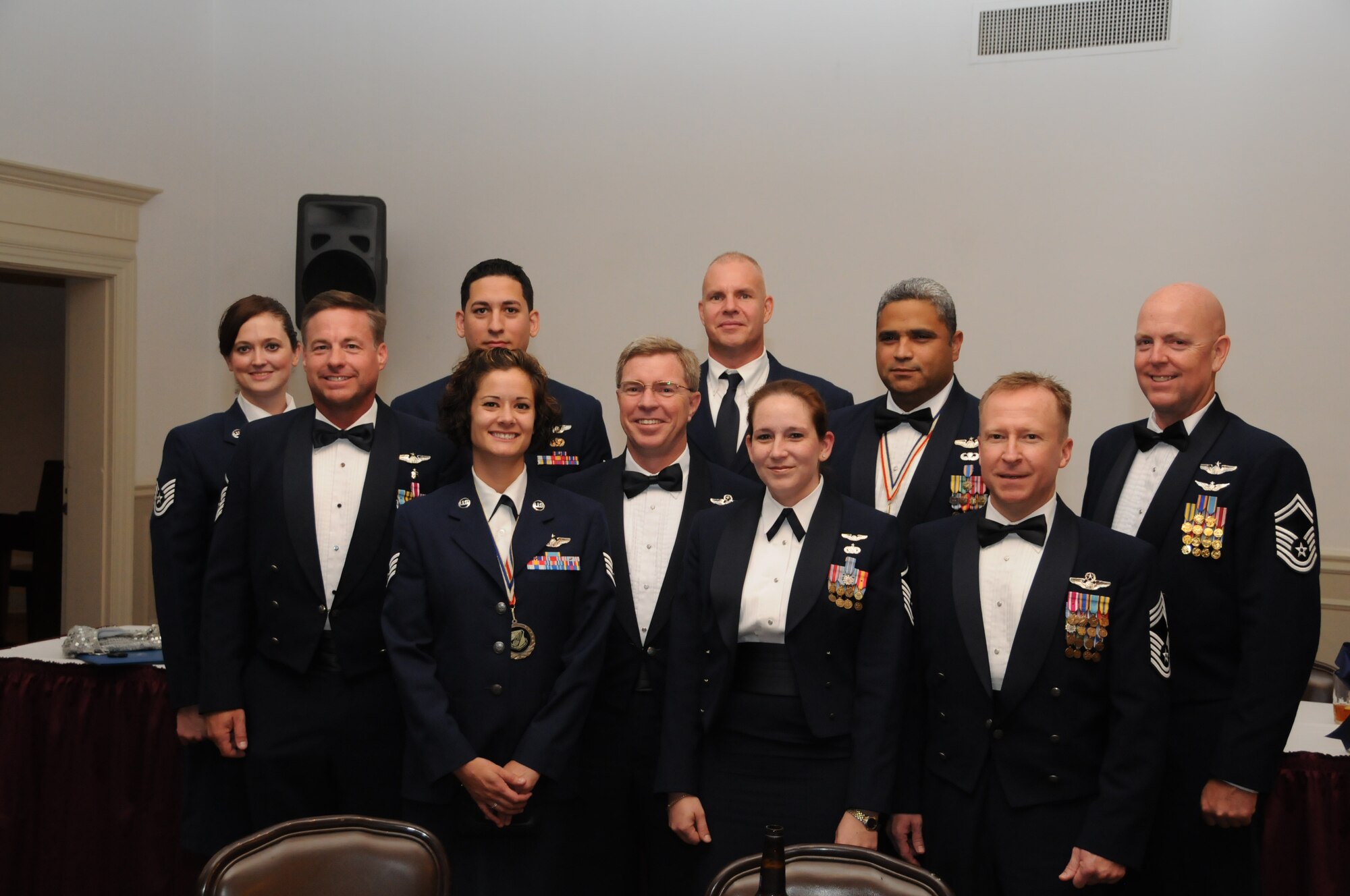The Ops Group folks really do clean up! Boom operators pose for the camera during the wing's Dining Out and Induction Ceremony during the July unit training assembly. (USAF photo by TSgt. Scotty Sweatt, 916ARW/PA)