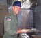 LANGLEY AIR FORCE BASE, Va. -- Col. Matt Molloy, 1st Fighter Wing commander, prepares cheeseburgers on the grill at the Raptor Cafe July 6. Colonel Molloy and Chief Master Sgt. Kevin Jurgella, 1 FW command chief, joined the 633d Force Support Squadron food service professionals in preparing lunch at the cafe. (Photo courtesy/Tech. Sgt. Lisette Spencer)