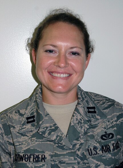 Capt. Mary Schwoerer, Air Force Academy Class of 2002, joins the Liberty Wing?s 512th Civil Engineer Squadron as a civil engineer. She does the same job as a civilian for the Army Corps of Engineers at Fort Meade, Md. Captain Schwoerer hopes to attend law school with the Post 9/11 GI Bill. She and her husband reside in Arlington, Va., with their dog and cat. (U.S. Air Force photo/Tech. Sgt. Christin Michaud)