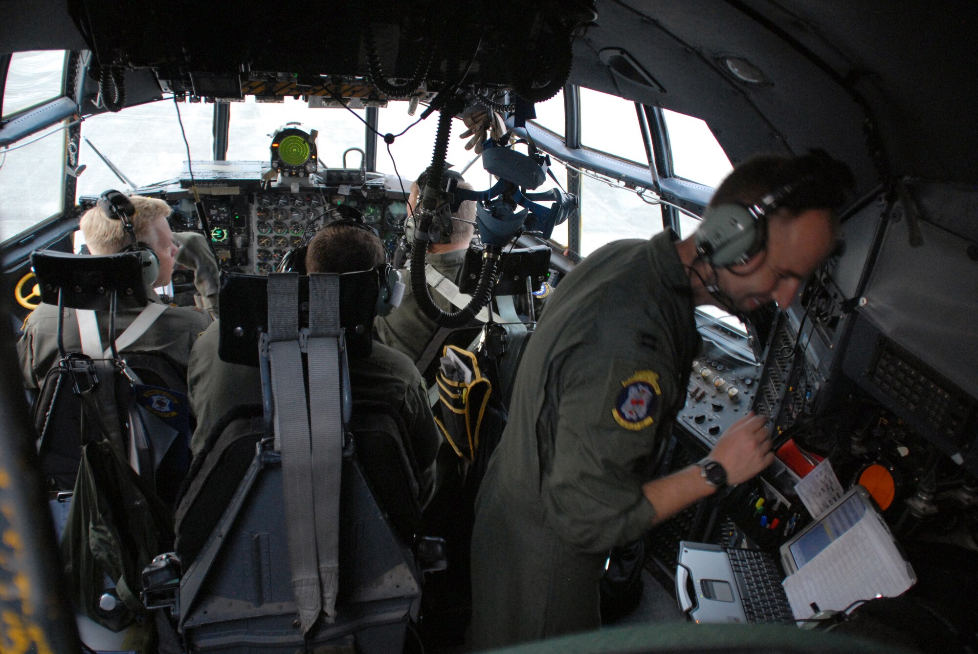(From left) Maj. Lars Johnsen, Staff Sgt. Thomas Brown, Capt. Jason Robinson, Capt. Brian Shea and 1st Lt. Stefan Idso prepare for their second mission during a joint forcible entry exercise June 22, 2010 at Pope Air Force Base and Fort Bragg, N.C. The crew are assigned to the 53rd Airlift Squadron, Little Rock AFB, Ark. (U.S. Air Force photo/Capt. Joe Knable)