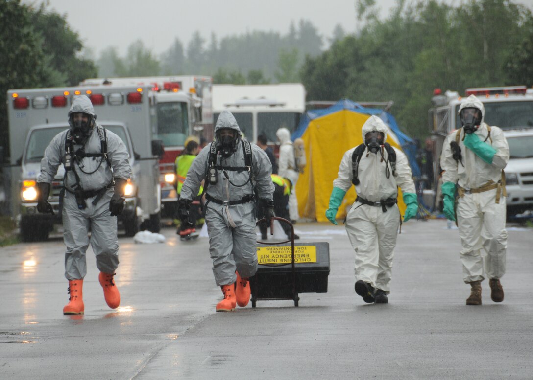 The Niagara Falls Air Reserve Station conducts a joint exercise with local civilian agencies to ensure the readiness of both the installation, and the community, in the event of a major accident or disaster July 9, 2010 Niagara Falls, NY. This exercise was a simulation of a commercial tanker truck that crashed into a ditch resulting in a hazardous material spill. (U.S. Air Force photo by Staff Sgt. Joseph McKee)