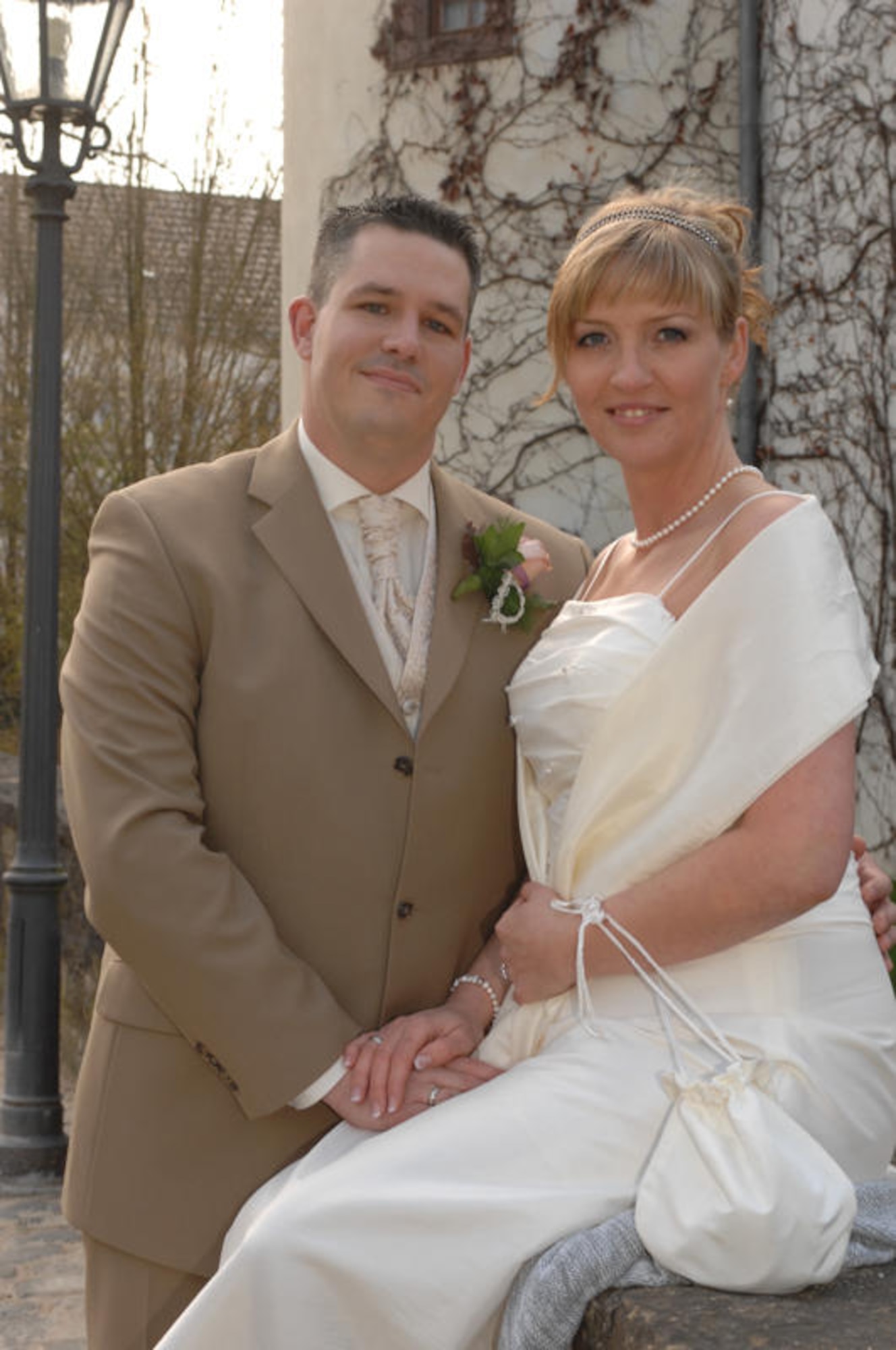 SPANGDAHLEM AIR BASE, Germany – Staff Sgt. Matthew Bright and his wife, Sheila, pose for a photo following their wedding April 18, 2008. At the time Sergeant Bright weighed approximately 265 pounds. (U.S. Air Force photo/Kristin Ruleau)