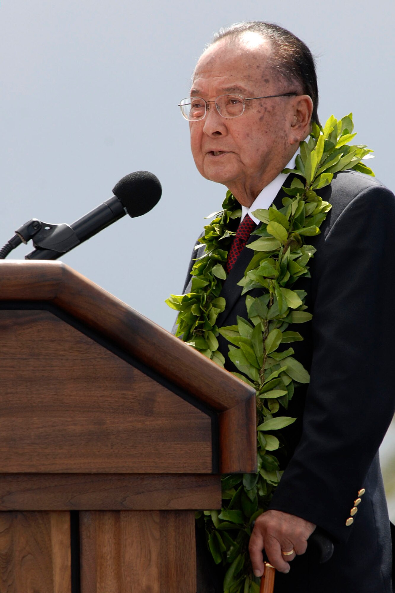 U.S. Senator Daniel K. Inouye speaks at the F-22 Arrival Ceremony July 9, 2010, at Joint Base Pearl Harbor-Hickam, Hawaii. Senator Inouye was on hand to help usher in a new era between the Hawaii Air National Guard and Active Duty Air Force. The arrival of the F-22 Raptor marks the beginning of a new associate unit between the 154th Wing, Hawaii Air National Guard, and the 15th Wing, active duty Air Force. This is the first time an F-22 Raptor associate unit will be led by the Guard. The Raptor represents an exponential leap in warfighting capabilities for U.S. forces in the Pacific. (U.S. Air Force photo/Tech Sgt. Jerome S. Tayborn)