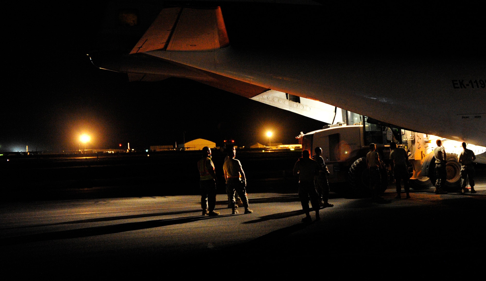 CAMP MARMAL, MAZAR-I-SHARIF, Afghanistan – An Antonov AN-21 is unloaded by members of the 621st Contingency Response Wing from Joint-Base McGuire-Dix-Lakehurst, NJ, at Camp Marmal, Afghanistan July 2. The mobility Airmen of the CRW often download cargo from international aircraft in its mission to provide short notice or high demand aerial port capability to austere or storm-damaged locations.  (U.S. Air Force photo/Tech. Sgt. Parker Gyokeres/released)