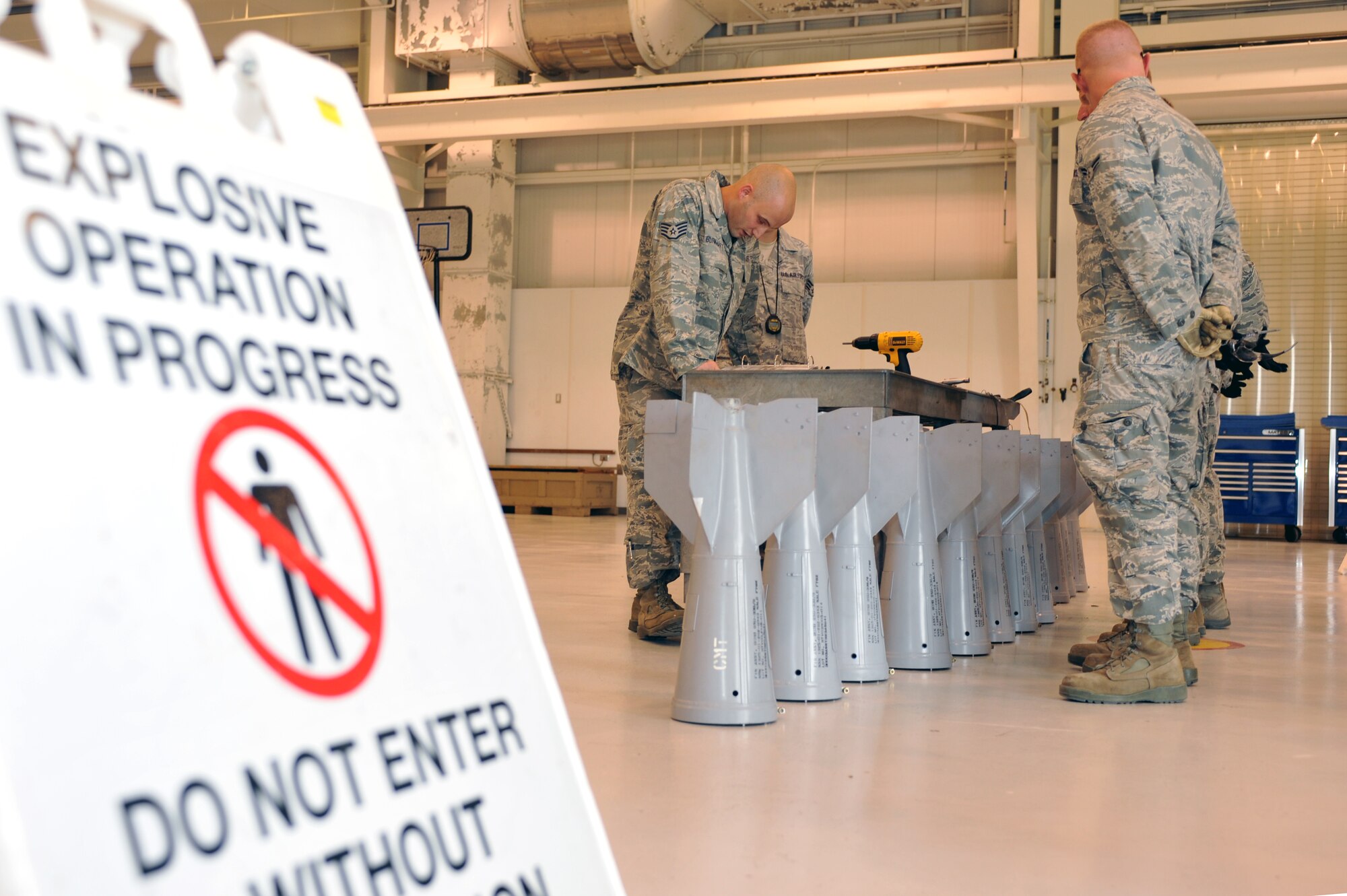 WHITEMAN AFB, Mo. - Staff Sgt. John Burkhart, 131st Bomb Wing, briefs Airmen from the 509th Munitions Squadron on safety procedures prior to beginning a practice session for the Air Force Global Strike Command Challenge, Jul. 12. The 509th MUNS team consisted of seven Whiteman AFB Airmen, three of which are guardsmen from the 131st Bomb Wing.