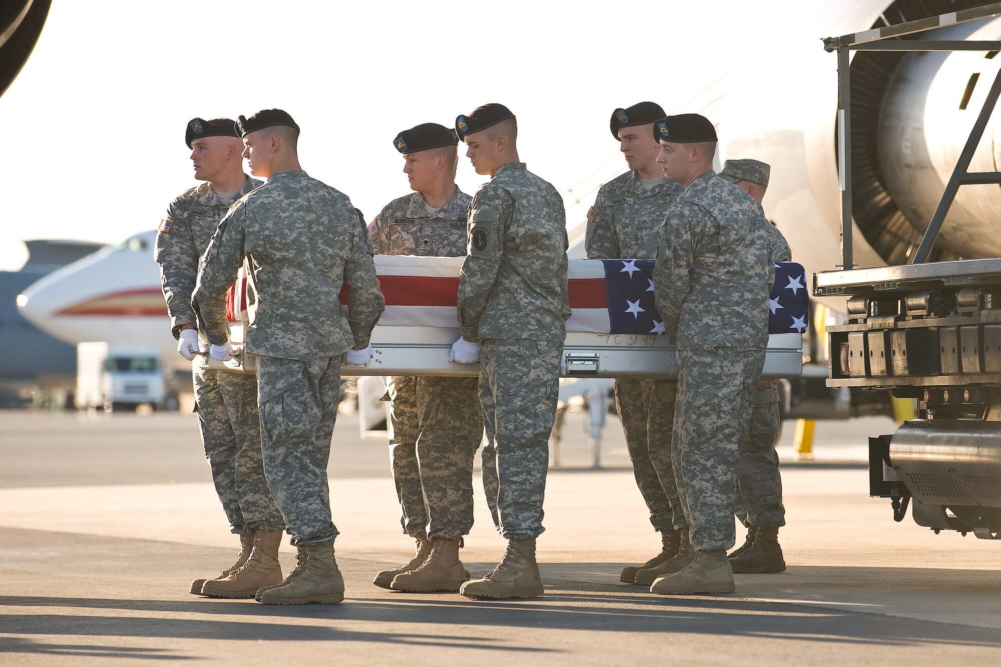 A U.S. Army carry team transfers the remains of Army Spc. Matthew R. Hennigan, of Las Vegas, Nev., at Dover Air Force Base, Del., July 2. Spc. Hennigan was assigned to the 173rd Special Troops Battalion, 173rd Airborne  Brigade Combat Team, Bamberg, Germany. (U.S. Air Force photo/Roland Balik)