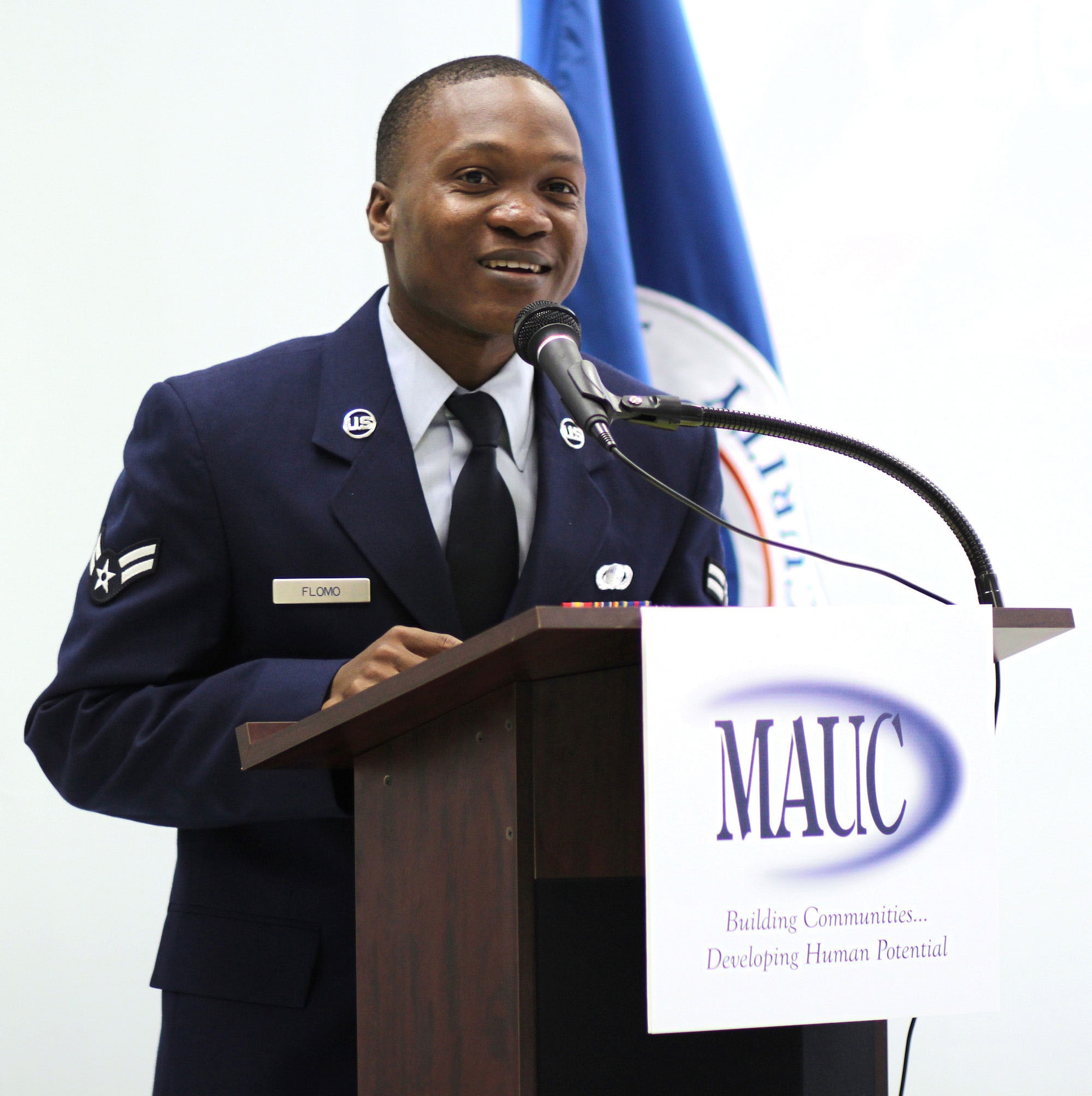 Airman 1st Class Abraham Flomo, Air Force Personnel Center sustainment apprentice, speaks during a special naturalization ceremony July 9 in San Antonio. (Air Force photo by Staff Sgt. Steve Grever)