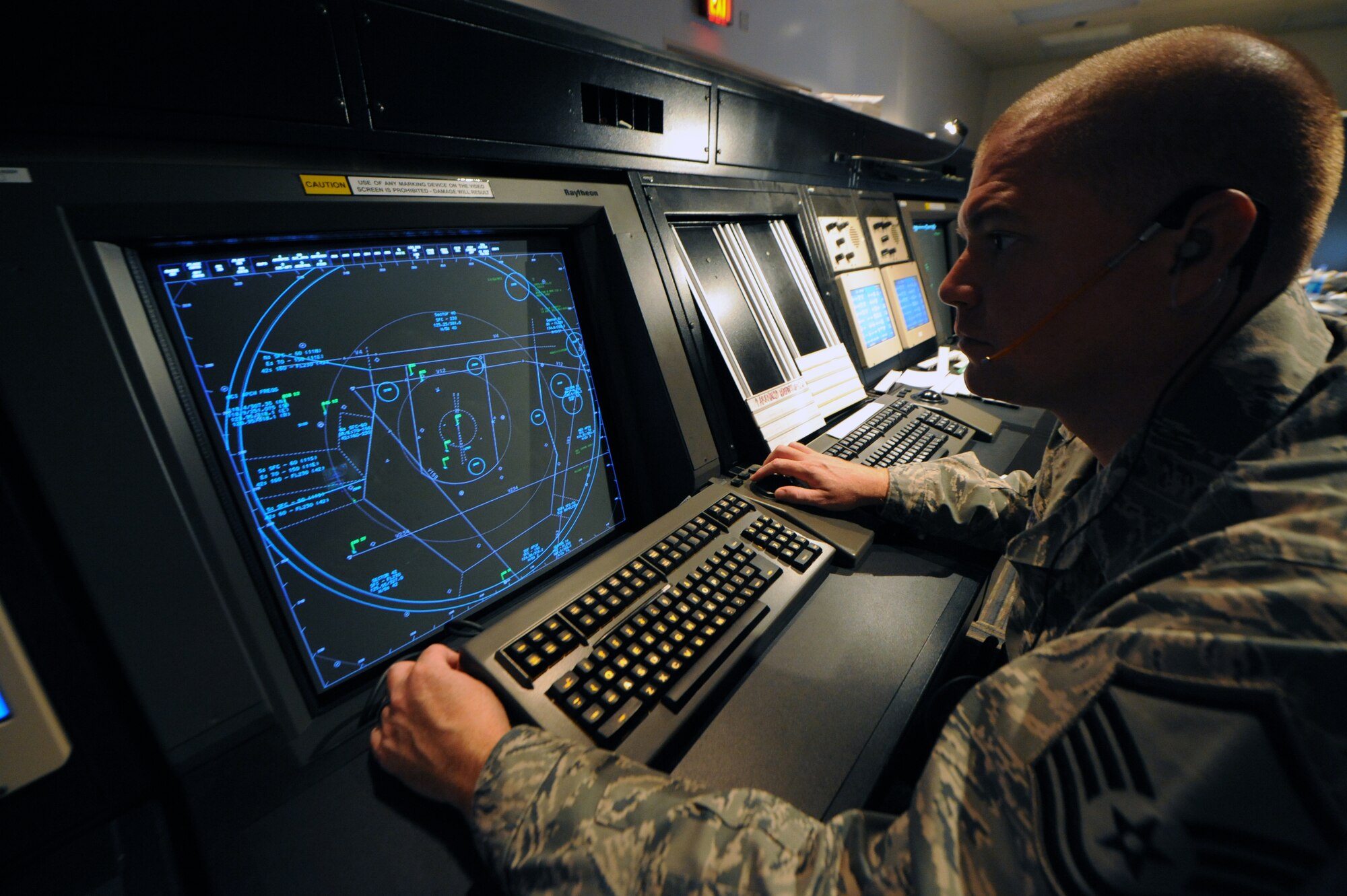WHITEMAN AIR FORCE BASE, Mo., -- Master Sgt. Lowell Morris, 509th Operations Support Squadron, guides aircraft through Whiteman's airspace.  While deployed, Sergeant Morris coordinated airspace used for combat operations. 
(U.S. Air Force photo/Staff Sgt. Jason Huddleston) (Released)

