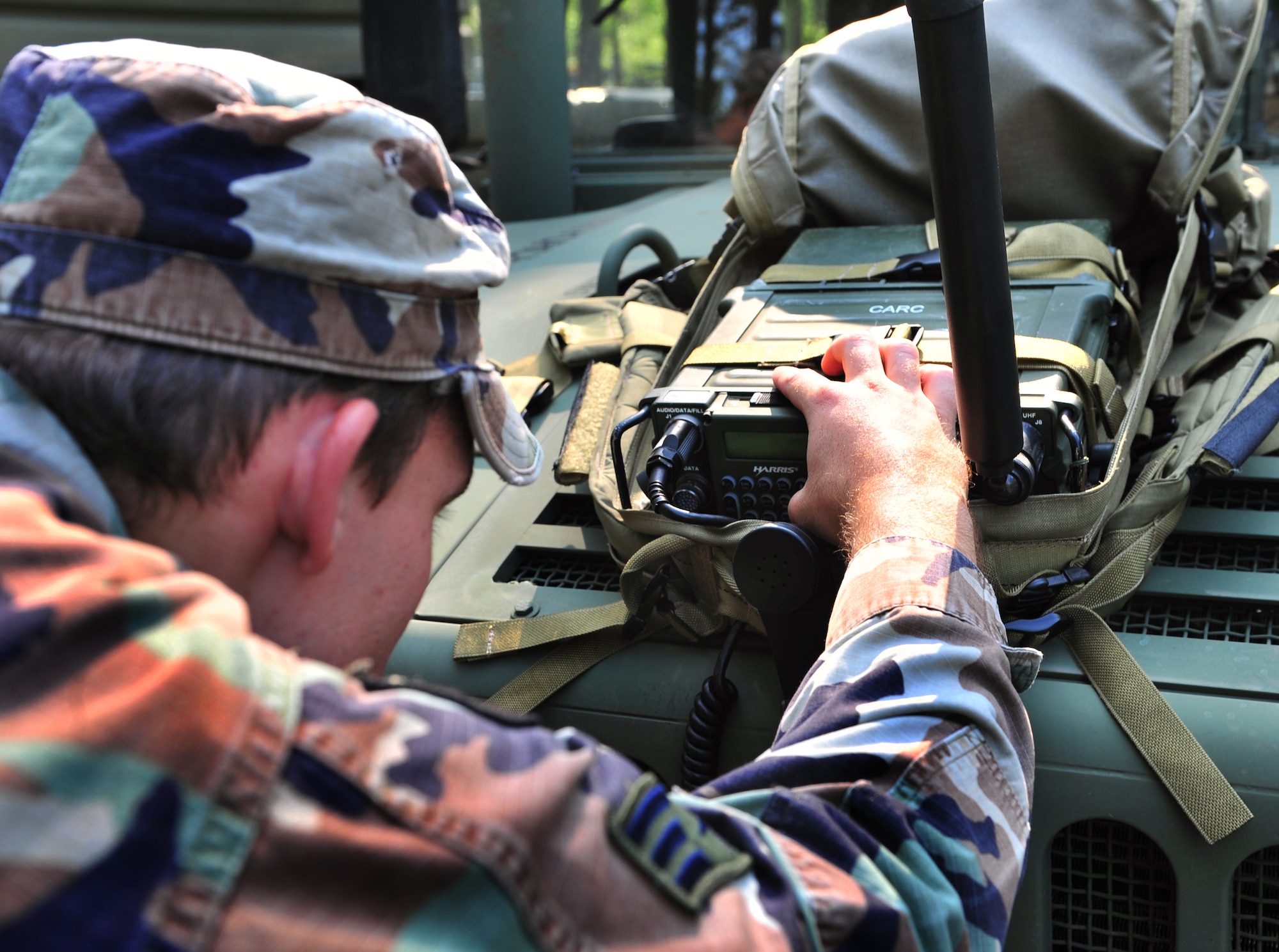 100708-F-8430J-191
SHAW AIR FORCE, S.C. - Senior Airman Michael Munson, 682nd Air Support Operations Squadron and tactical air control party, practices using a PRC-117F (primary man-portable radio) during a TACP exercise, July 7, 2010. Airman Munson is a TACP member and is responsible for several different jobs in the squadron including supervising and instructing during training exercises. The TACP members are specialists who are assigned to combat units. They advise ground forces on aircraft employment and capabilities, coordinate and control aerospace operation and participate in battle planning. (U.S. Air Force photo/Airman 1st Class Amber E. N. Jacobs)
