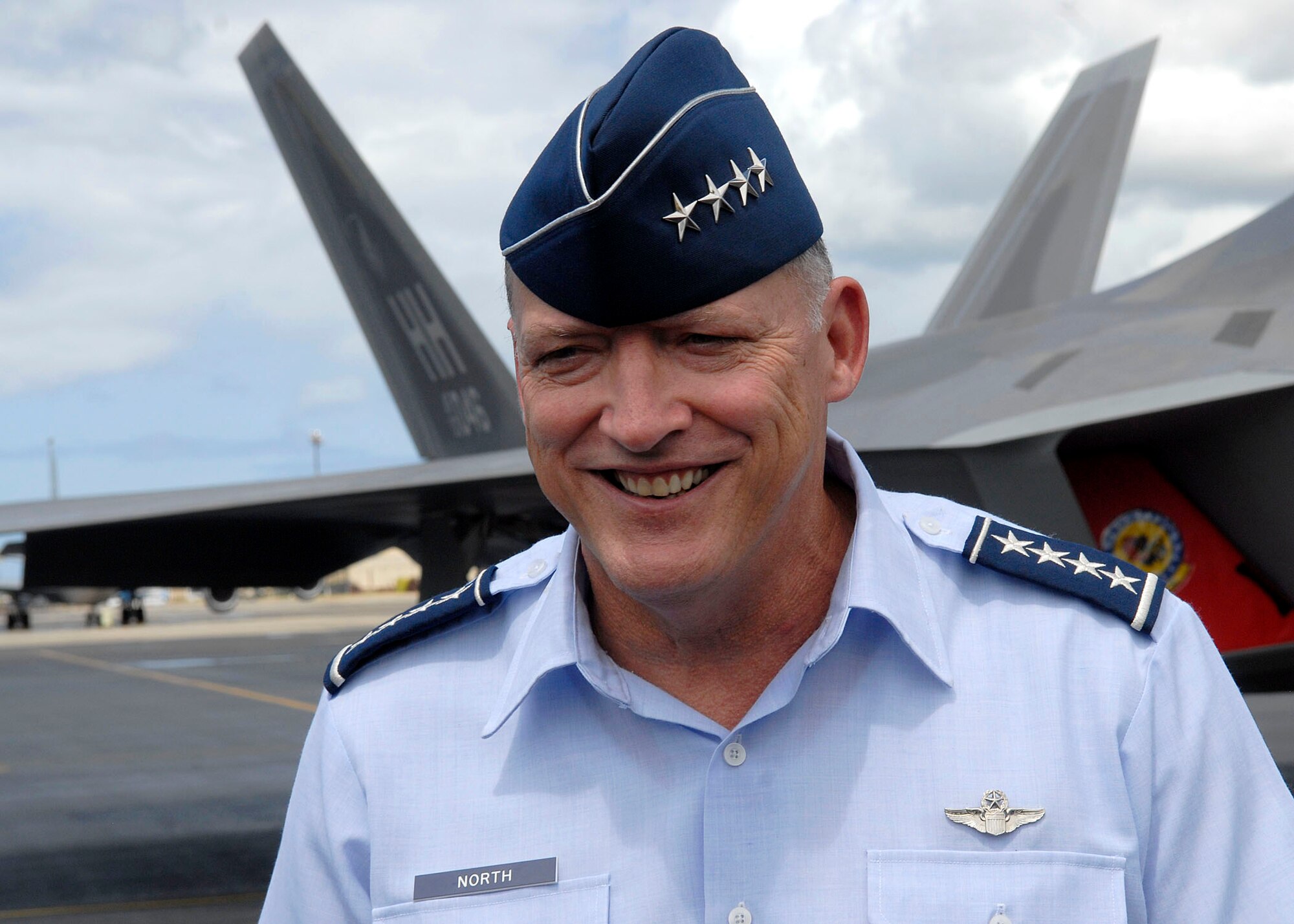 Gen. Gary North Commander, Pacific Air Forces gives interviews to the press at for the F-22 Arrival Ceremony at Joint Base Pearl Harbor-Hickam, Hawaii, July 9, 2010. The 199th Fighter Squadron of the Hawaii Air National Guard is transitioning from the F-16 and will serve as the only Air National Guard led joint Guard and Active Duty squadron in the Pacific and the second in the U.S. Air Force. The Raptor represents an exponential leap in warfighting capabilities for U.S. forces in the Pacific. (U.S. Air Force photo/Tech Sgt. Jerome S. Tayborn)