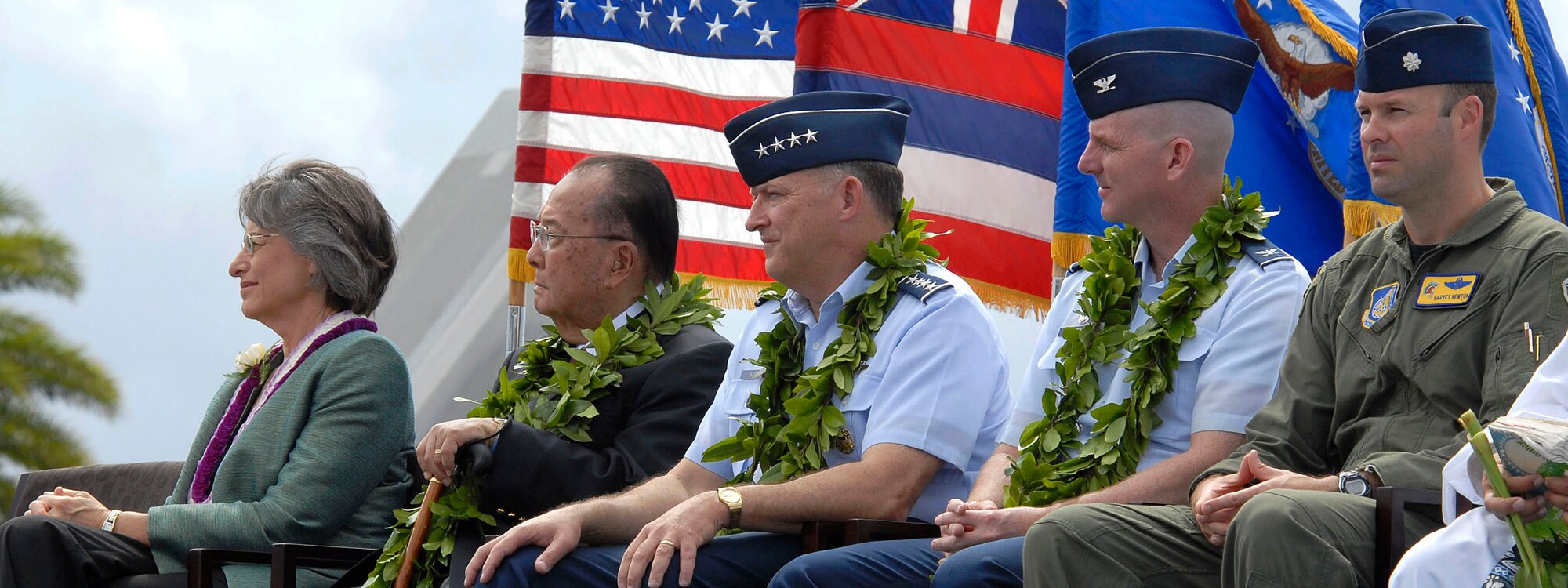 (From left to right) Governor Linda Lingle, Senator Daniel K. Inouye, Gen. Gary North Commander, Pacific Air Forces, Col. Sam S. Barrett, 15th Wing Commander, and Lt. Col. Harvey Newton, pilot 19th Fighter Squadron at the opening ceremony for the F-22 Raptors Arrival Ceremony at Joint Base Pearl Harbor-Hickam, Hawaii, July 9, 2010. The F-22 Raptor is the Air Force's newest fighter aircraft. Its combination of stealth, supercruise, maneuverability, and integrated avionics, coupled with improved supportability, represents an exponential leap in warfighting capabilities. The ceremony marks the beginning of the partnership between the Hawaii Air National Guard and the active duty Air Force flying the fifth generation fighter at Hickam. The F-22 Raptors are assigned to the 199th Fighter Squadron, 154th Wing, Hawaii Air National Guard and the 19th Fighter Squadron, 15th Wing. The Raptor represents an exponential leap in warfighting capabilities for U.S. forces in the Pacific. (U.S. Air Force photo/Tech Sgt. Jerome S. Tayborn) 