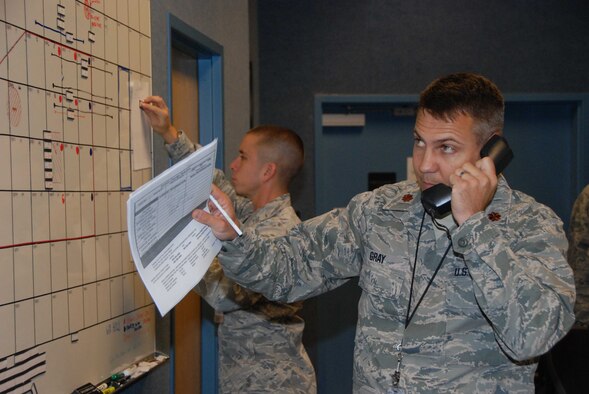 TYNDALL AIR FORCE BASE, Fla. -- Maj. Dwayne Gray, Aviation Coordination Command airspace manager, coordinates flight operations in the Deepwater Horizon Response air operations area. (U.S. Air Force photo/Maj. Steve Burke)