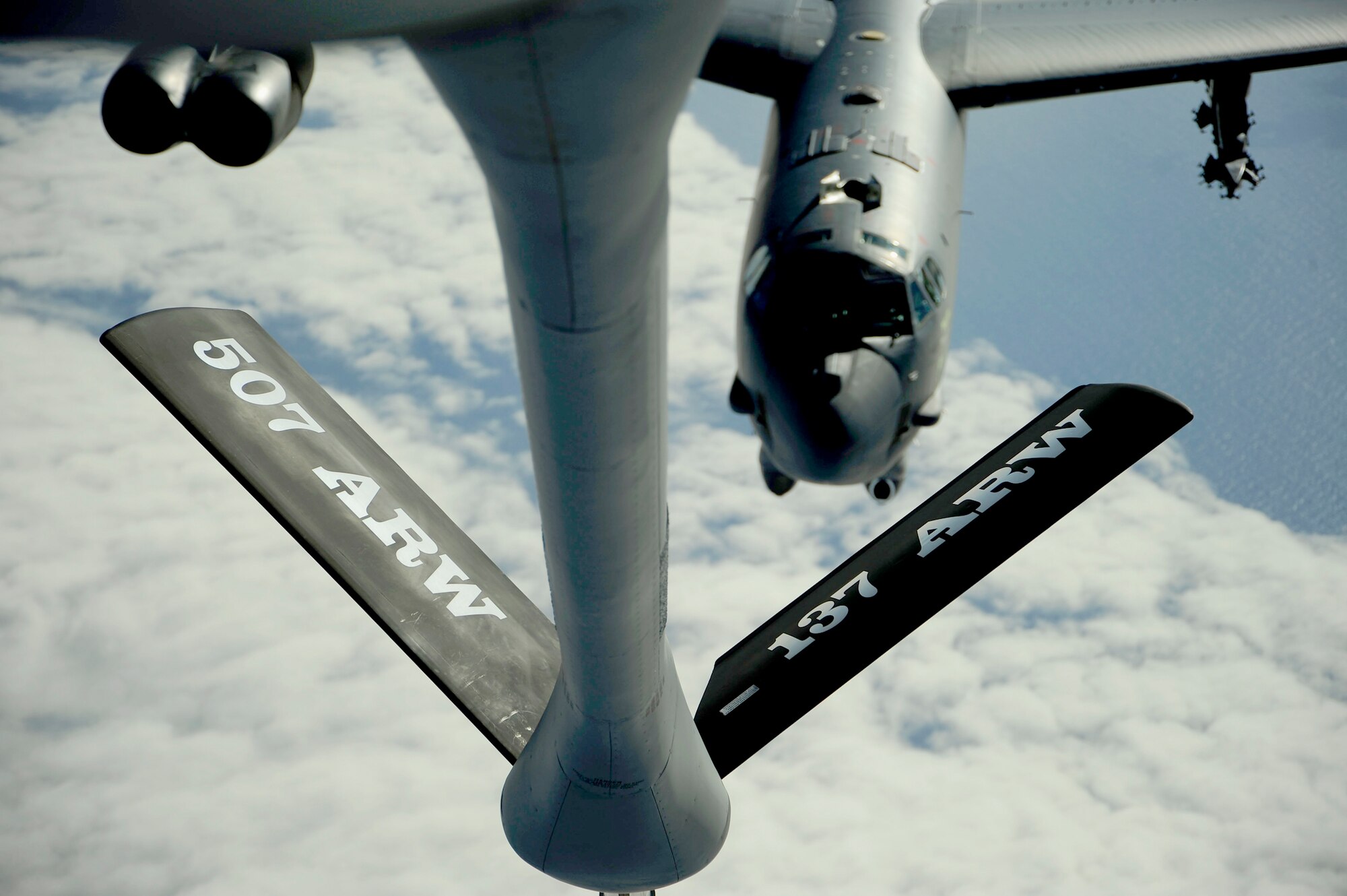 A B-52 Stratofortress prepares for a fuel delivery from a KC-135 Stratotanker in support of exercise Rim of the Pacific exercise, or RIMPAC July 10, 2010, over the Pacific Ocean.  RIMPAC is a biennial, multinational exercise designed to strengthen regional partnerships and improve interoperability.  The B-52 is from the 20th Bomb Squadron at Barksdale Air Force Base, La., and the KC-135 is assigned to the 465th Air Refueling Squadron at Tinker Air Force Base, Okla.  (U.S. Air Force photo/Staff Sgt. Kamaile O. Long)