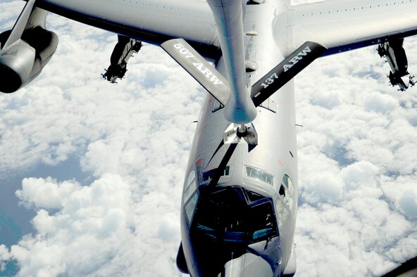 A B-52 Stratofortress receives fuel from a KC-135 Stratotanker in support of exercise Rim of the Pacific July 10, 2010, over the Pacific Ocean.  RIMPAC is a biennial, multinational exercise designed to strengthen regional partnerships and improve interoperability.  The B-52 is from the 20th Bomb Squadron at Barksdale Air Force Base, La., and the KC-135 is assigned to the 465th Air Refueling Squadron at Tinker Air Force Base, Okla.  (U.S. Air Force photo/Staff Sgt. Kamaile O. Long)