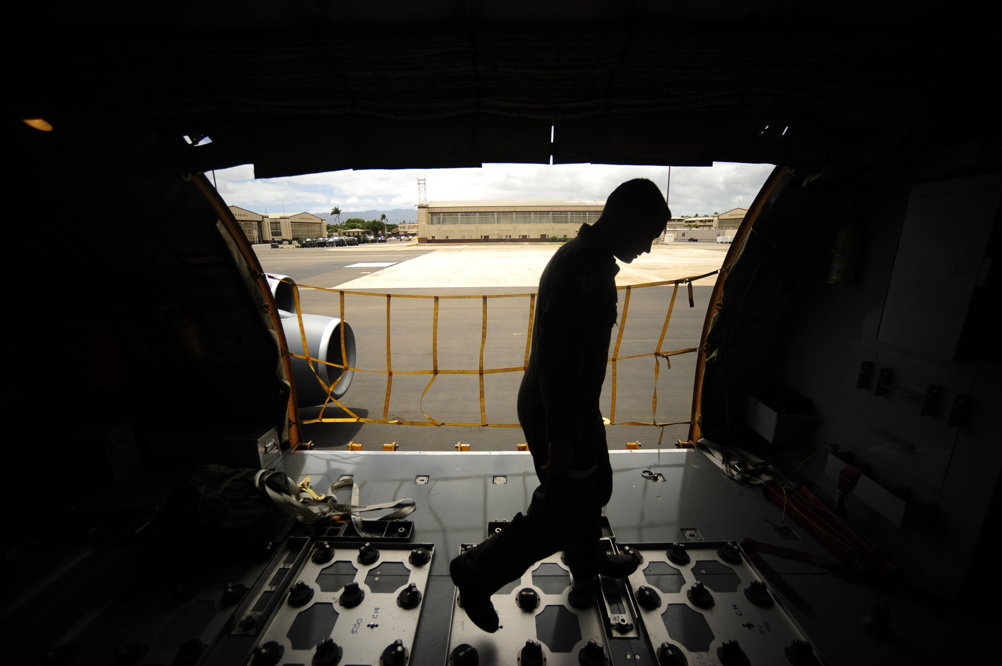 JOINT BASE PEARL HARBOR HICKAM, HAWAII (July 10, 2010) U.S. Air Force Capt. Clayton Adams, a KC-135 Stratotanker pilot with the 465th Air Refueling Squadron, Tinker AFB, Okla., conducts an aircraft inspection prior to a sortie in support of Rim of the Pacific (RIMPAC) 2010. RIMPAC includes more than 14 nations, 32 ships, five submarines, more than 170 aircraft and more than 20,000 Soldiers, Sailors, Marines and Airmen. RIMPAC enhances cooperation between partnering nations and practices our ability to plan, communicate, and execute operations. (U.S. Air Force photo by Tech. Sgt. Jacob N. Bailey/Released)
