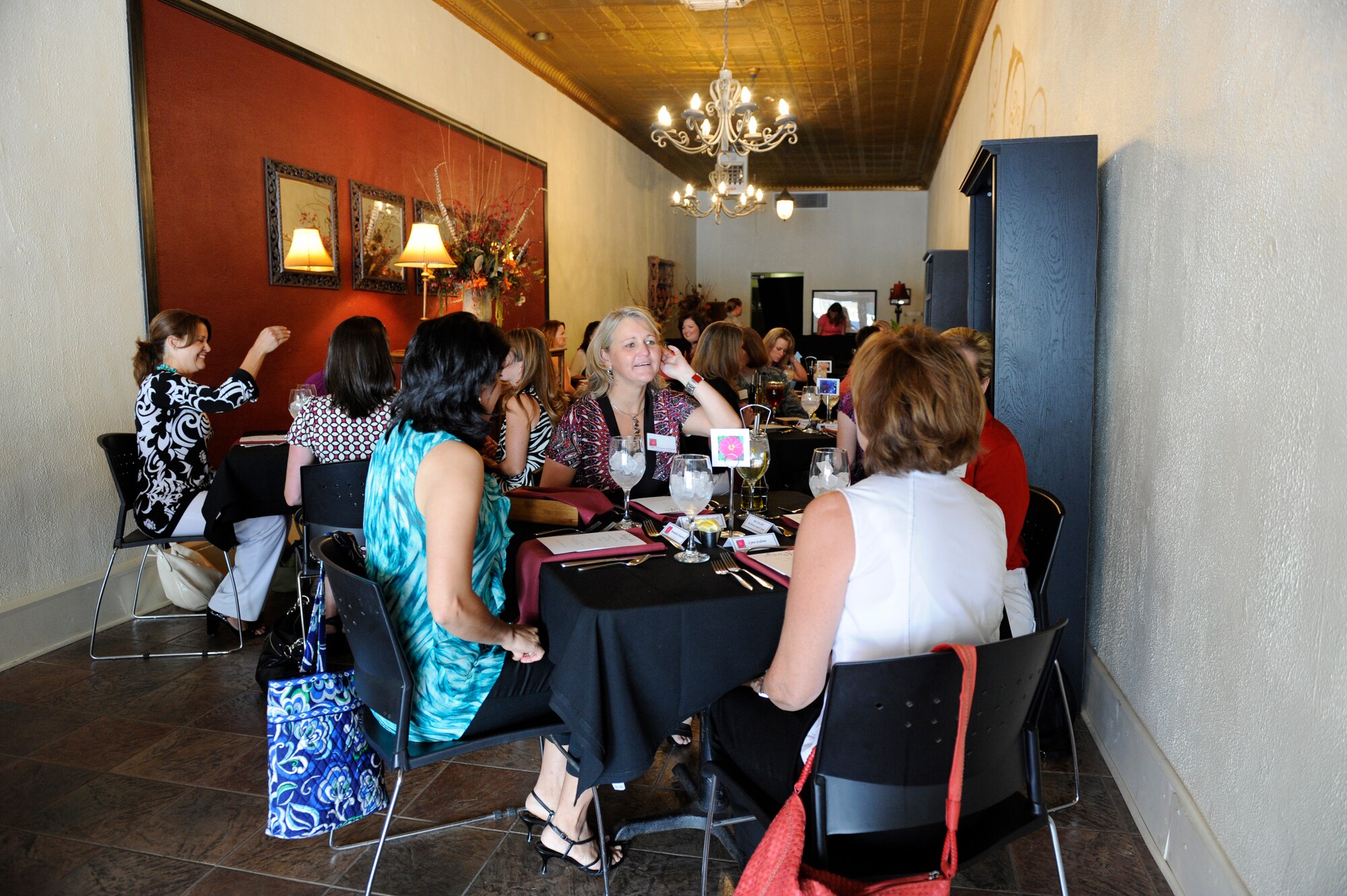 ALAMOGORDO, N.M. -- Commander's wives attend a luncheon hosted by Lisa Krumm, wife of 49th Wing commander, Col. David Krumm, at a local restaurant  July 7, 2010. Mrs. Krumm requested the luncheon with the military spouses to share her background and experiences. (U.S. Air Force photo by Airman 1st Class Eileen Payne / Released)