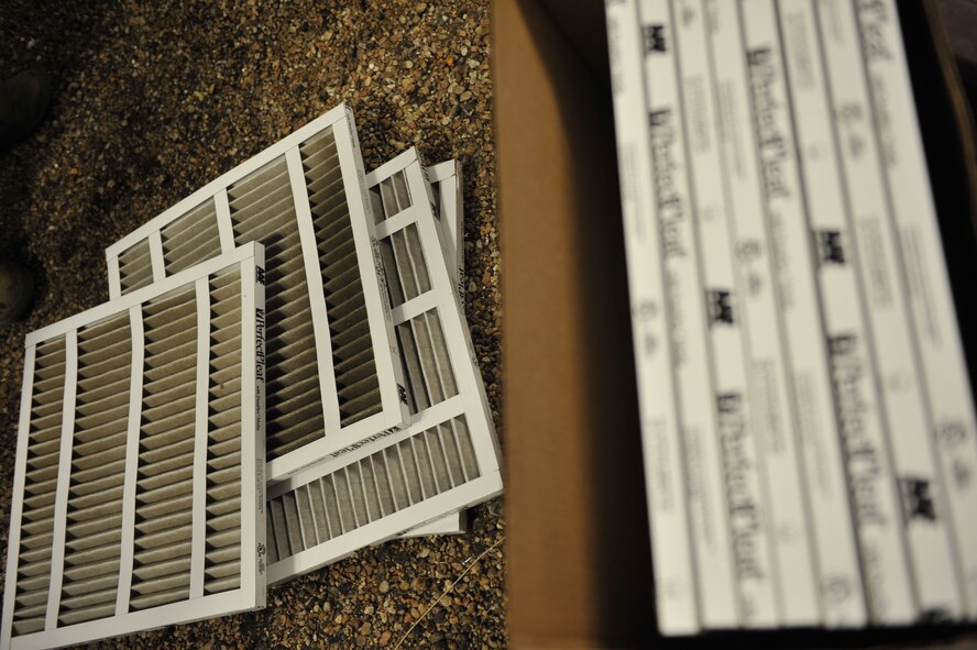 MOODY AIR FORCE BASE, Ga.-- A stack of used filters lie on the floor next to a box of new ones here July 7. The heating, ventilation, air conditioning and refrigeration shop does quarterly, annual or semi-annual maintenance depending on the type of unit. (U.S. Air Force photo by Staff Sgt. Schelli Jones/RELEASED)
