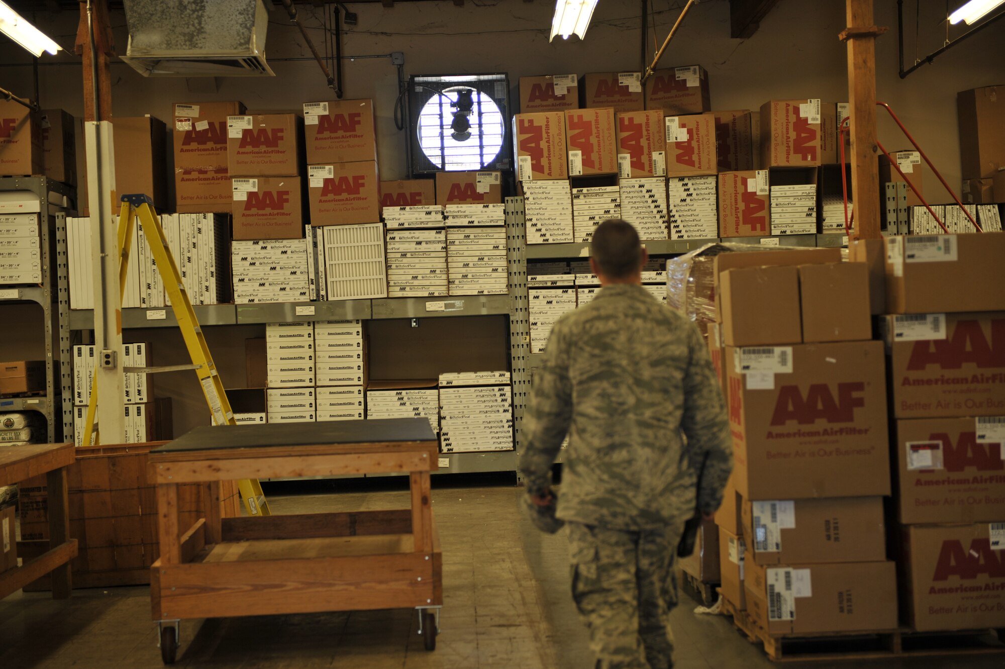 MOODY AIR FORCE BASE, Ga.-- Senior Airman Steven Kindle, 23rd Civil Engineer Squadron heating, ventilation, air conditioning and refrigeration journeyman, enters into a base warehouse to purchase filters here July 7. This warehouse provides supplies for all base agencies. (U.S. Air Force photo by Staff Sgt. Schelli Jones/RELEASED)