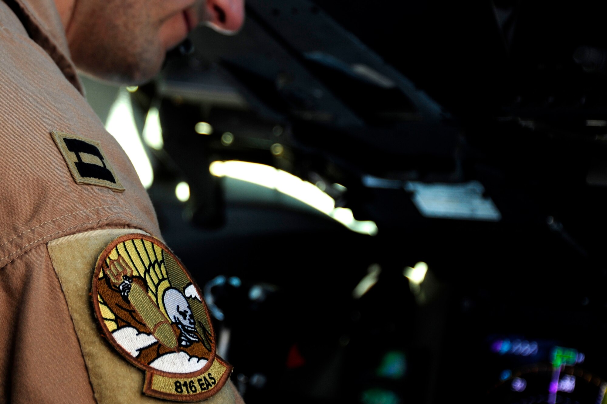 U.S. Air Force Capt. Kevin Kretz, a C-17 Globemaster III pilot assigned to the 816 Expeditionary Airlift Squadron, pilots his aircraft during a flying mission to Baghdad, Iraq, from an undisclosed location in Southwest Asia on July 6, 2010. (U.S. Air Force photo by Staff Sgt. Andy M. Kin / Released)