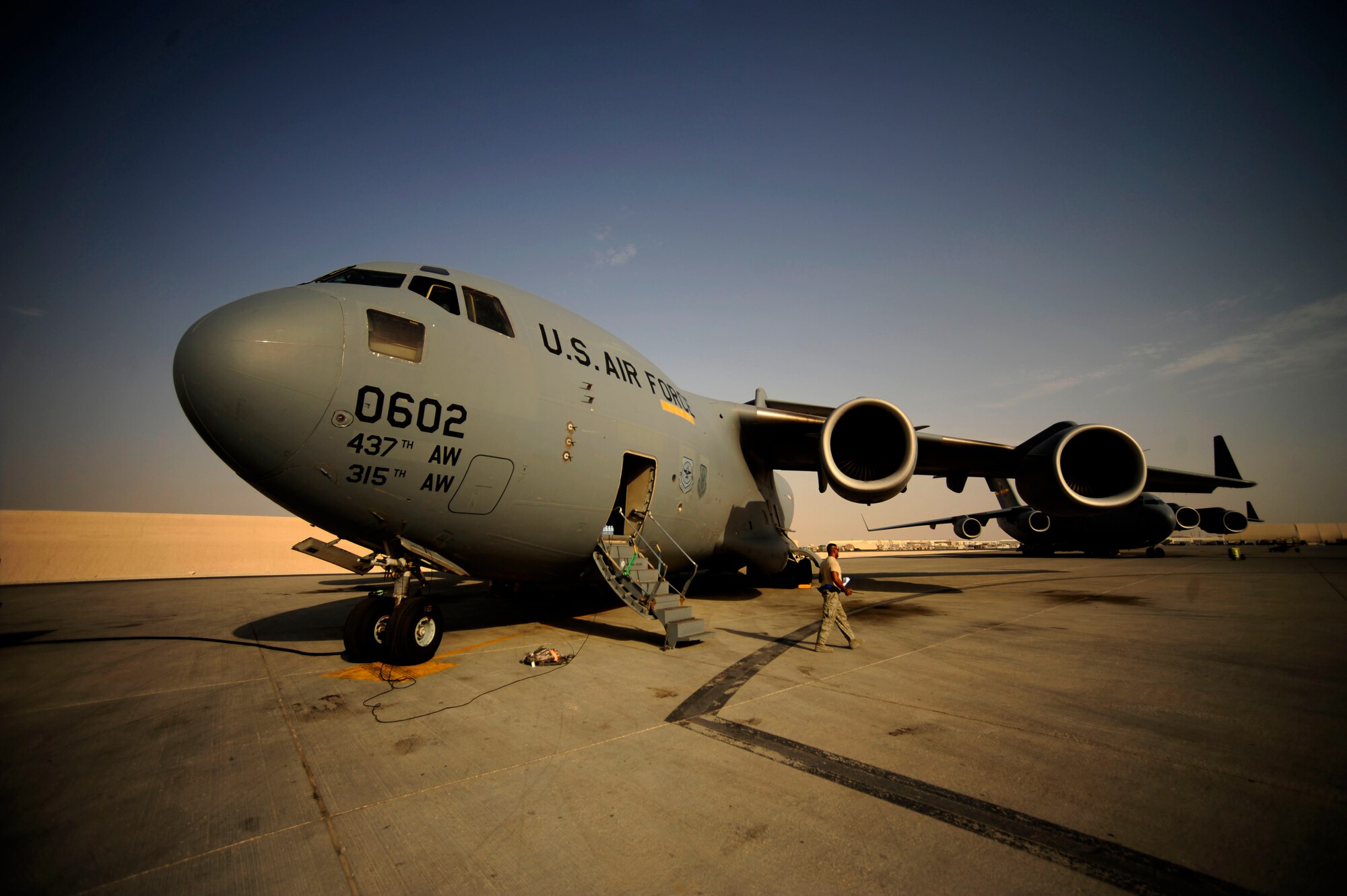 U.S. Air Force C-17 Globemaster III aircraft, assigned to Charleston Air Force Base, S.C., sits on the runway during pre-flight inspections at an undisclosed location in Southwest Asia on July 6, 2010.  (U.S. Air Force photo by Staff Sgt. Andy M. Kin / Released)