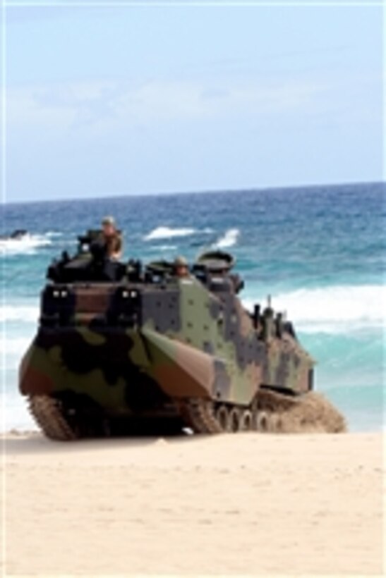 A U.S. Marine amphibious assault vehicle embarked aboard the amphibious transport dock USS Cleveland (LPD 7) transitions ashore during a mechanized raid rehearsal on Pyramid Rock Beach at Marine Corps Base Hawaii during Rim of the Pacific 2010 exercises on July 8, 2010.  Rim of the Pacific is a biennial, multinational exercise designed to strengthen regional partnerships and improve multinational interoperability.  