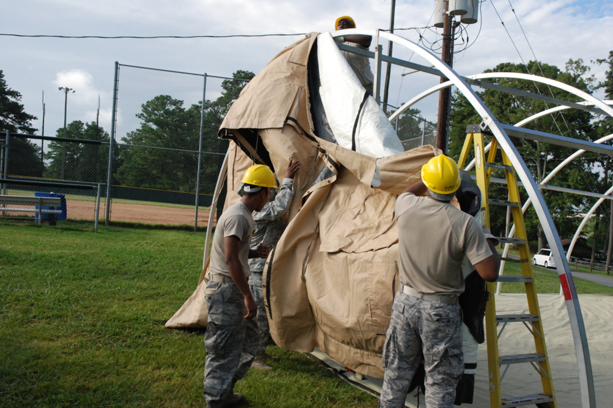 Members of the 94th Services Squadron participated in quarterly Single Pallet Expeditionary Kitchen (SPEK) Training July 10 at Dobbins Lakeside Facility. The SPEK fits on a standardized load pallet, can be operated by as few as four Airmen, takes approximately four hours to set up and can be easily loaded on a C-130 aircraft. With the SPEK, Services personnel can provide 550 Airmen a hot meal minutes after setup (U.S. Air Force photo/Master Sgt. James Branch)