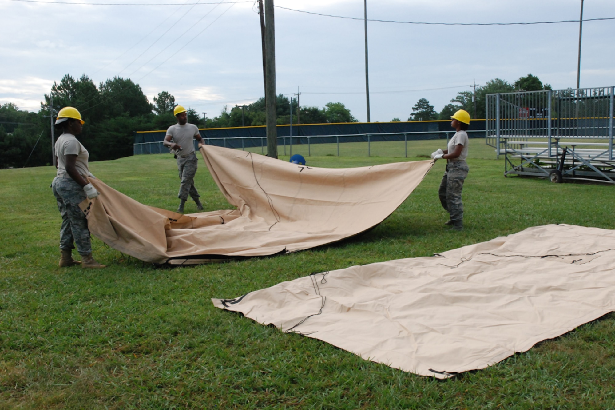 Members of the 94th Services Squadron participated in quarterly Single Pallet Expeditionary Kitchen (SPEK) Training July 10 at Dobbins Lakeside Facility. The SPEK fits on a standardized load pallet, can be operated by as few as four Airmen, takes approximately four hours to set up and can be easily loaded on a C-130 aircraft. With the SPEK, Services personnel can provide 550 Airmen a hot meal minutes after setup (U.S. Air Force photo/Master Sgt. James Branch)