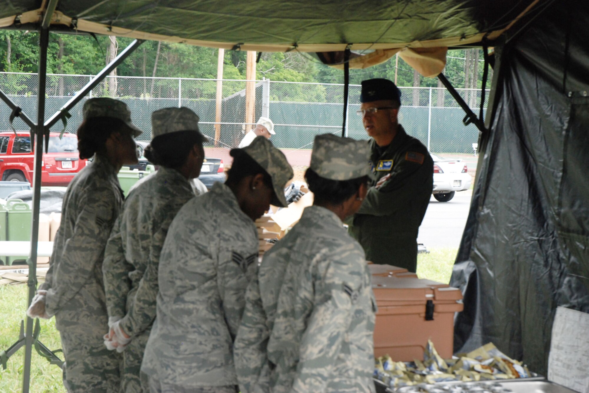 Members of the 94th Services Squadron participated in quarterly Single Pallet Expeditionary Kitchen (SPEK) Training July 10 at Dobbins Lakeside Facility. The SPEK fits on a standardized load pallet, can be operated by as few as four Airmen, takes approximately four hours to set up and can be easily loaded on a C-130 aircraft. With the SPEK, Services personnel can provide 550 Airmen a hot meal minutes after setup (U.S. Air Force photo/Master Sgt. James Branch)