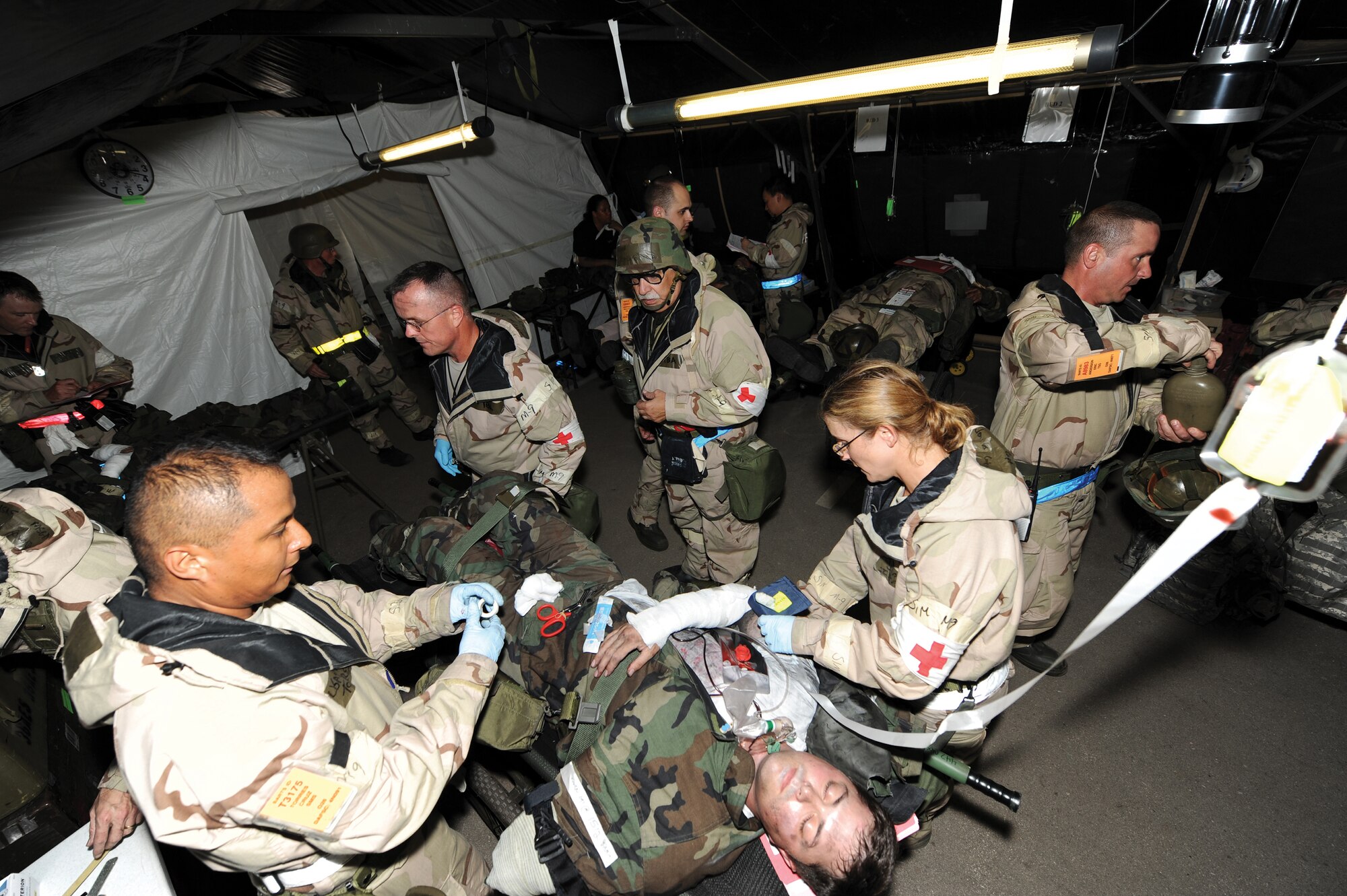 The 442nd Medical Squadron works to save a "victim" during the operational readiness inspection July 10, 2010. The 442nd MDS is part of the 442nd Fighter Wing, an A-10 Thunderbolt II unit at Whiteman Air Force Base, Mo. (U.S. Air Force photo/Senior Airman Carlin Leslie)