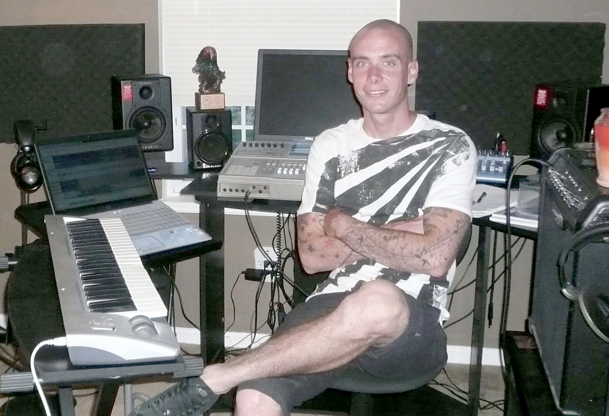 Staff Sgt. Richard Justice recently won the My Air Force Life Original Song Contest for his original song, "That's Why We Serve." Sergeant Justice wrote, produced and did all the vocals for his song in his in-home recording studio, pictured here. Sergeant Justice is the 3rd Space Operations Squadron procedures NCOIC. (U.S. Air Force photo/Rachel Justice)
