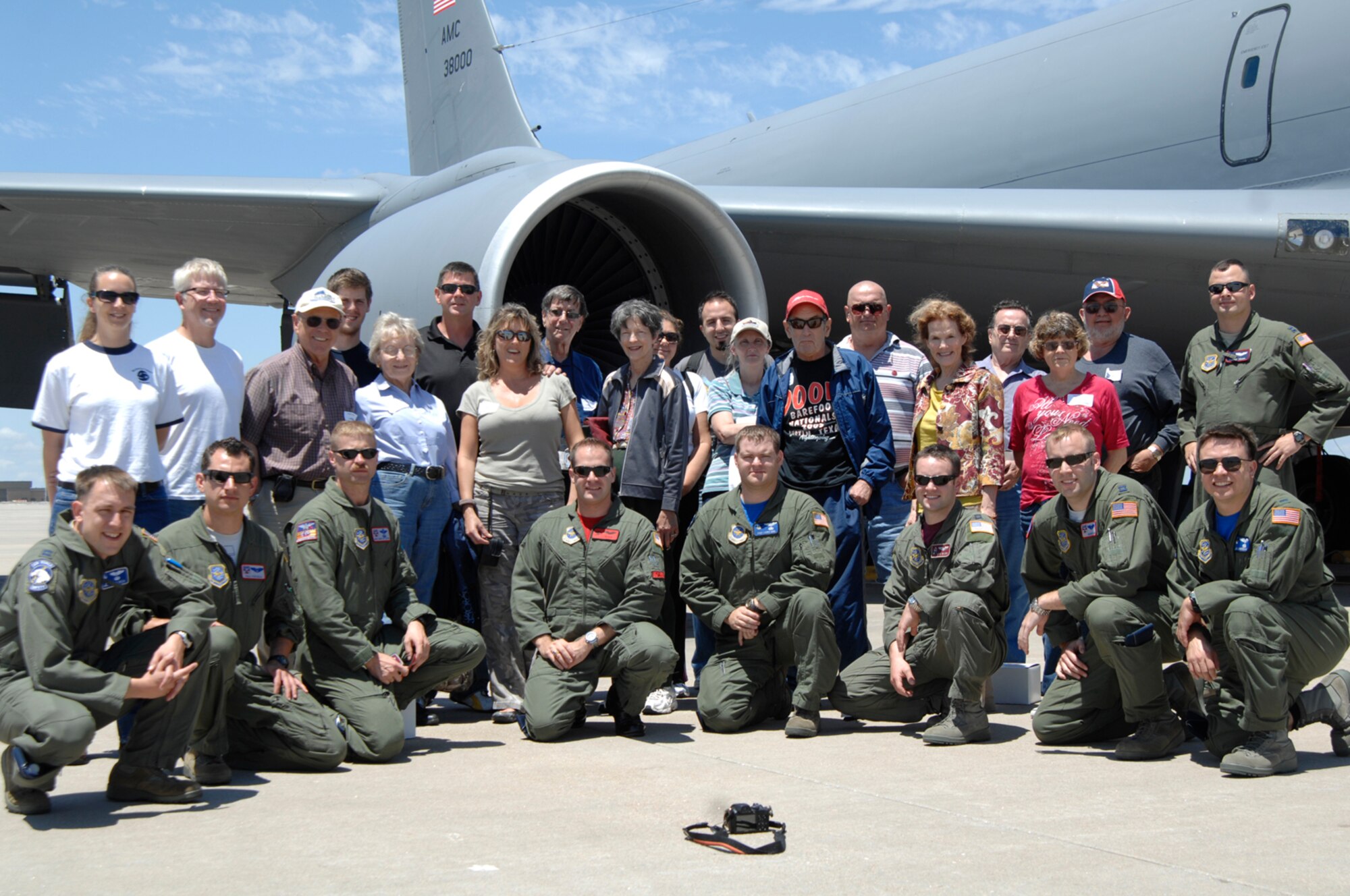 McConnell neighboring landowners pose with aircrew members after participating in a Landowner’s Appreciation Flight July, 9, 2010.  Sixteen local landowners participated in the flight which displayed McConnell’s appreciation for the landowner’s cooperation in the Bird Aircraft Strike Hazard program.  The BASH program has helped McConnell reduce the number of bird strikes by one-third.  Each of McConnell’s 63 KC-135 Stratotankers costs approximately $39.6 million dollars.  (U.S. Air Force photo/Senior Airman Abigail Klein)