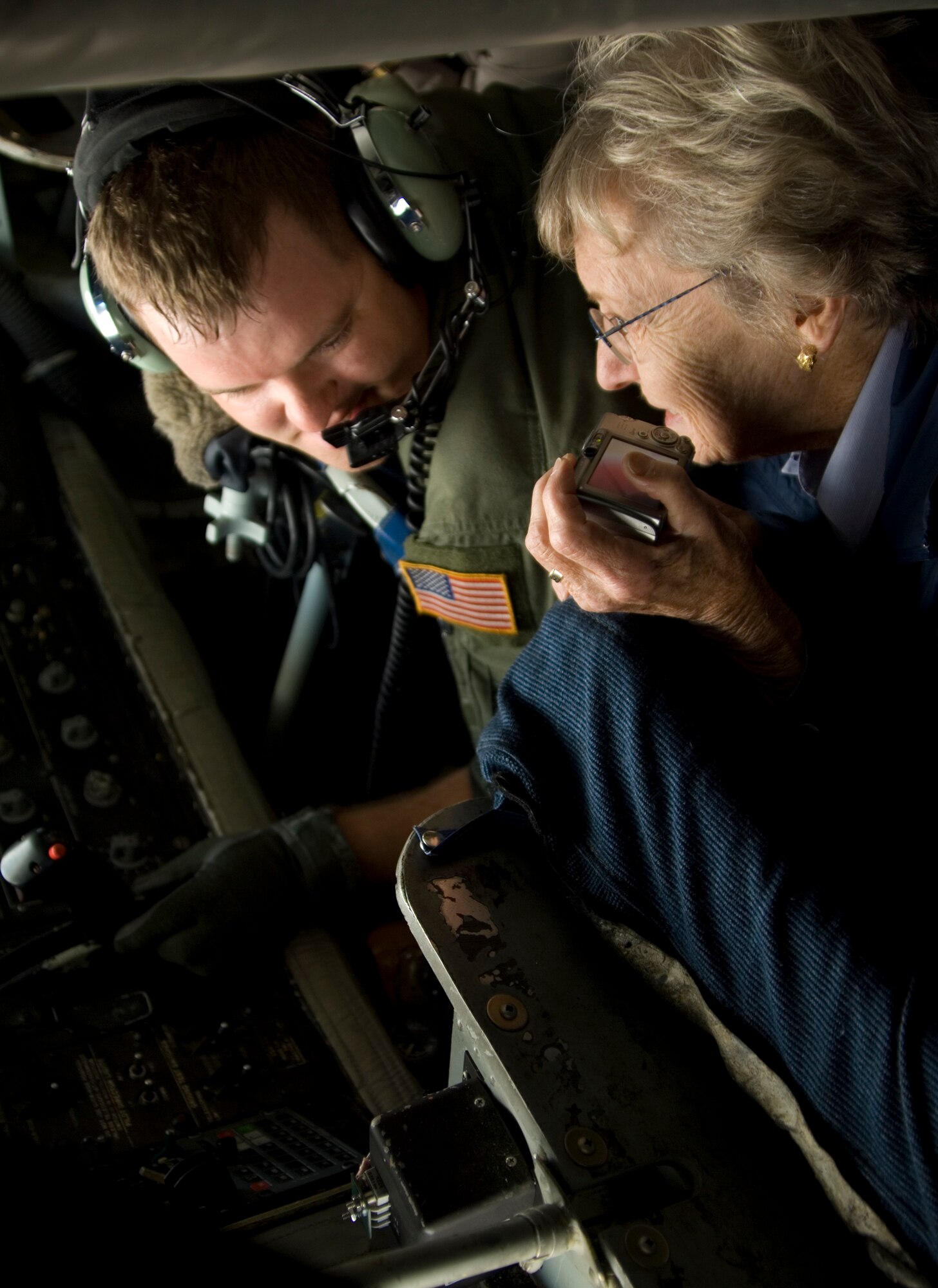 Staff Sgt. Larry King, 344th Air Refueling Squadron boom operator, discusses his job as a KC-135 Stratotanker boom operator with Noreen Sholts, McConnell neighboring landowner, July 9, 2010.  As a boom operator, Sergeant King flies more than three times a week to refuel a variety of aircraft.  (U.S. Air Force photo/ Senior Airman Abigail Klein)